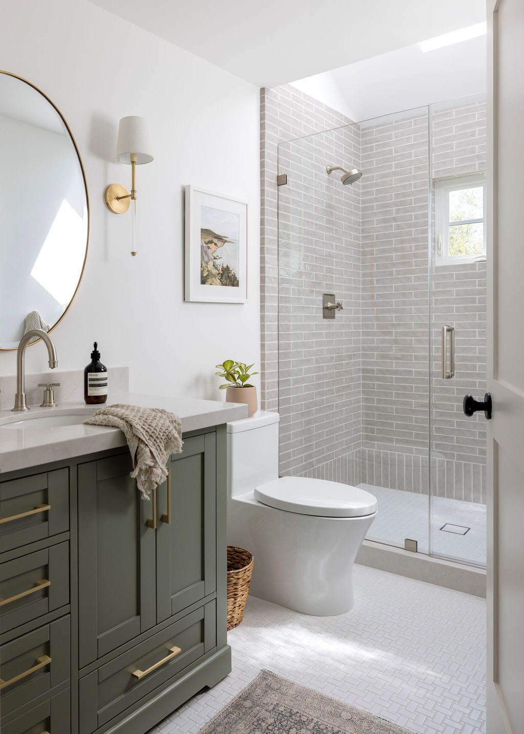 Sage Green Vanity with Brass Hardware Creates a Bold Statement