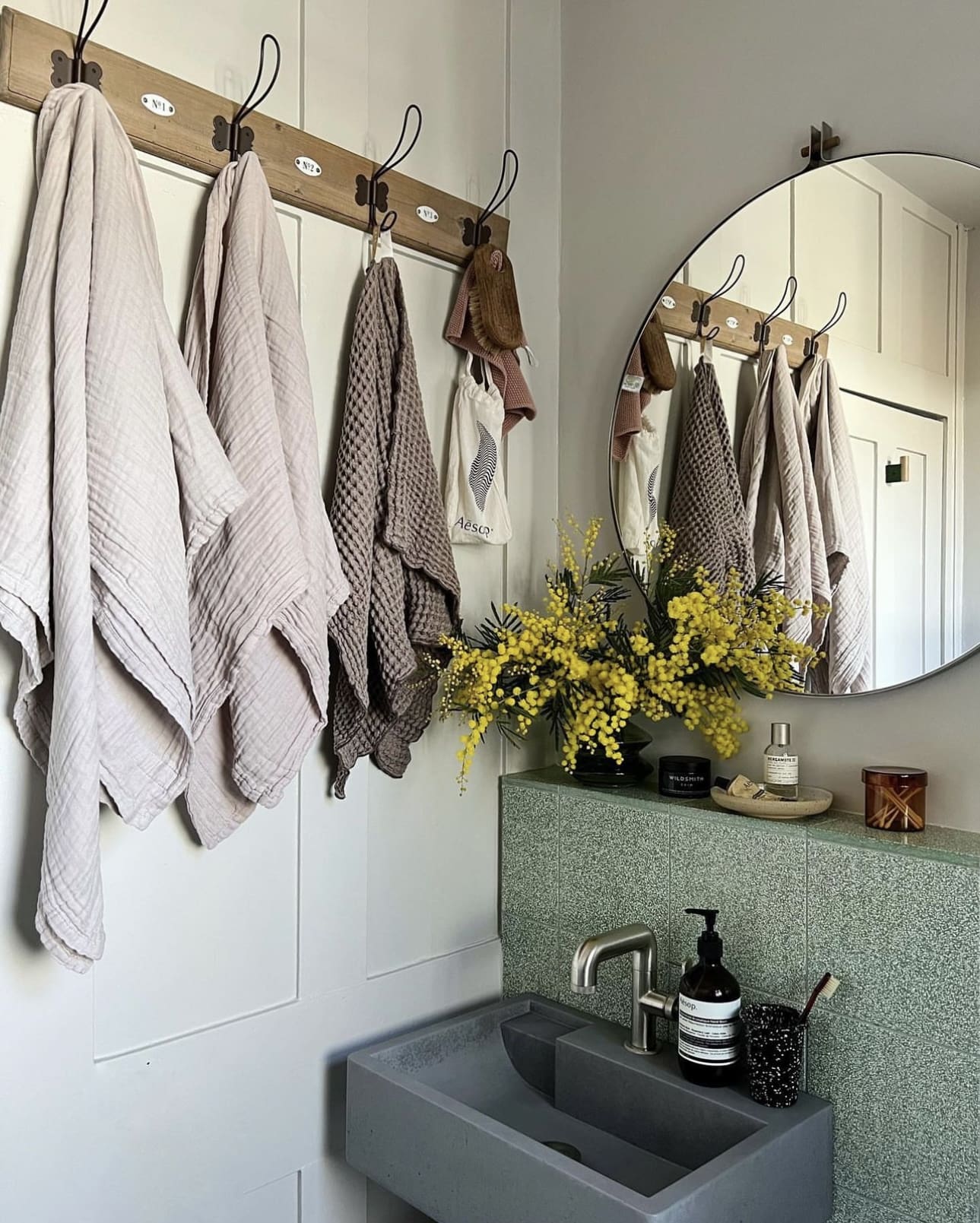 Wooden Coat Rack With Numbered Plaques Holds Towels