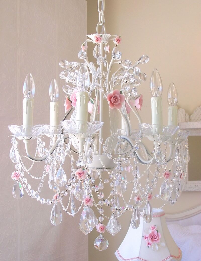 White Chandelier Adorned With Delicate Pink Roses