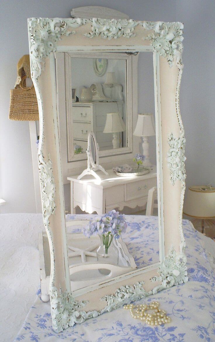 Ornate Mirror Frame With Floral Carvings Adds Romantic Flair