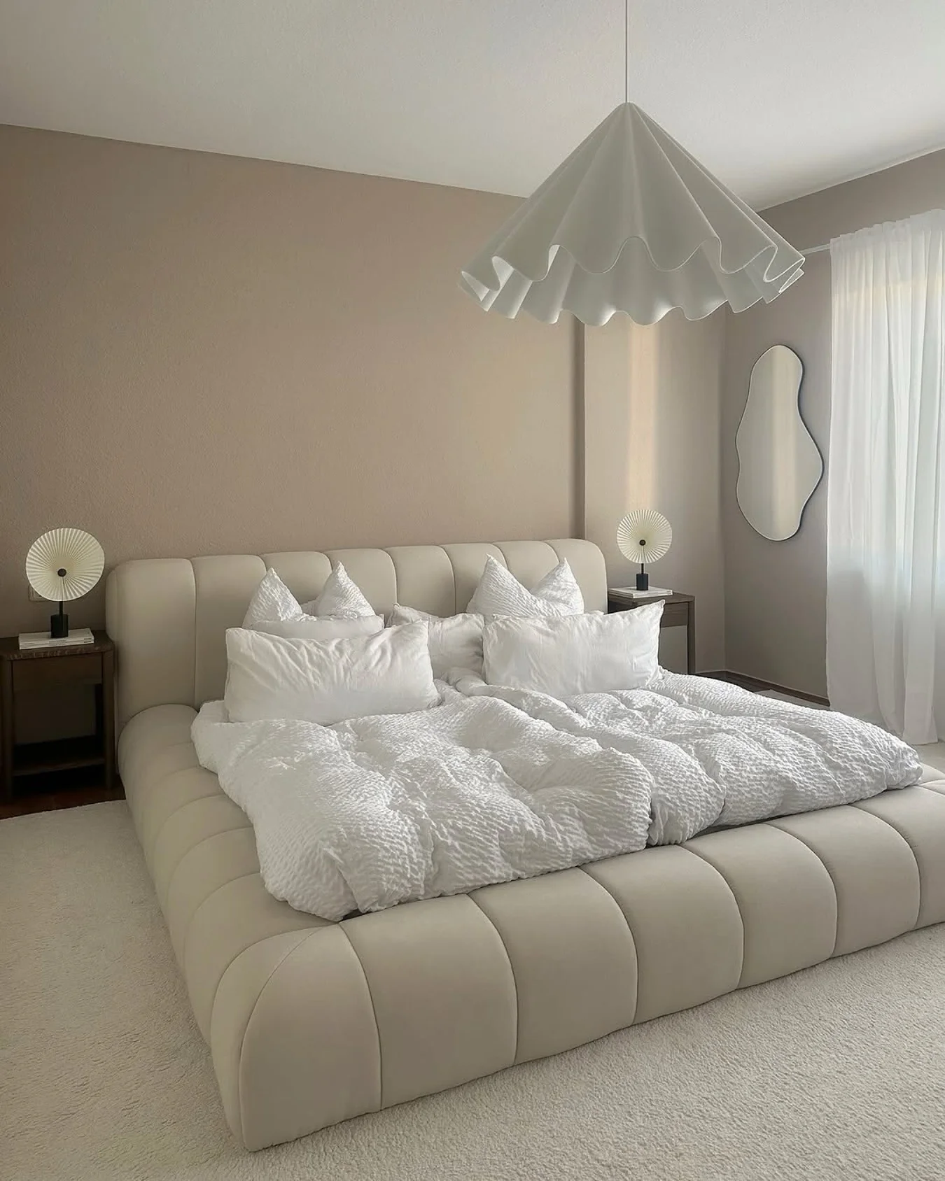 Soft, Sculptural Bed Frame Creates a Pillow-Like Base