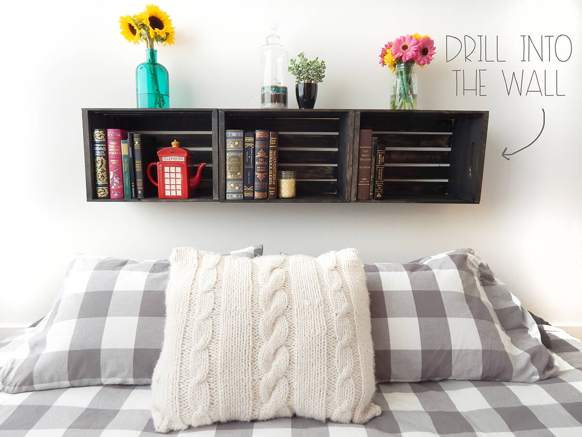 Dark Crate Shelves Create a Bedside Book Nook