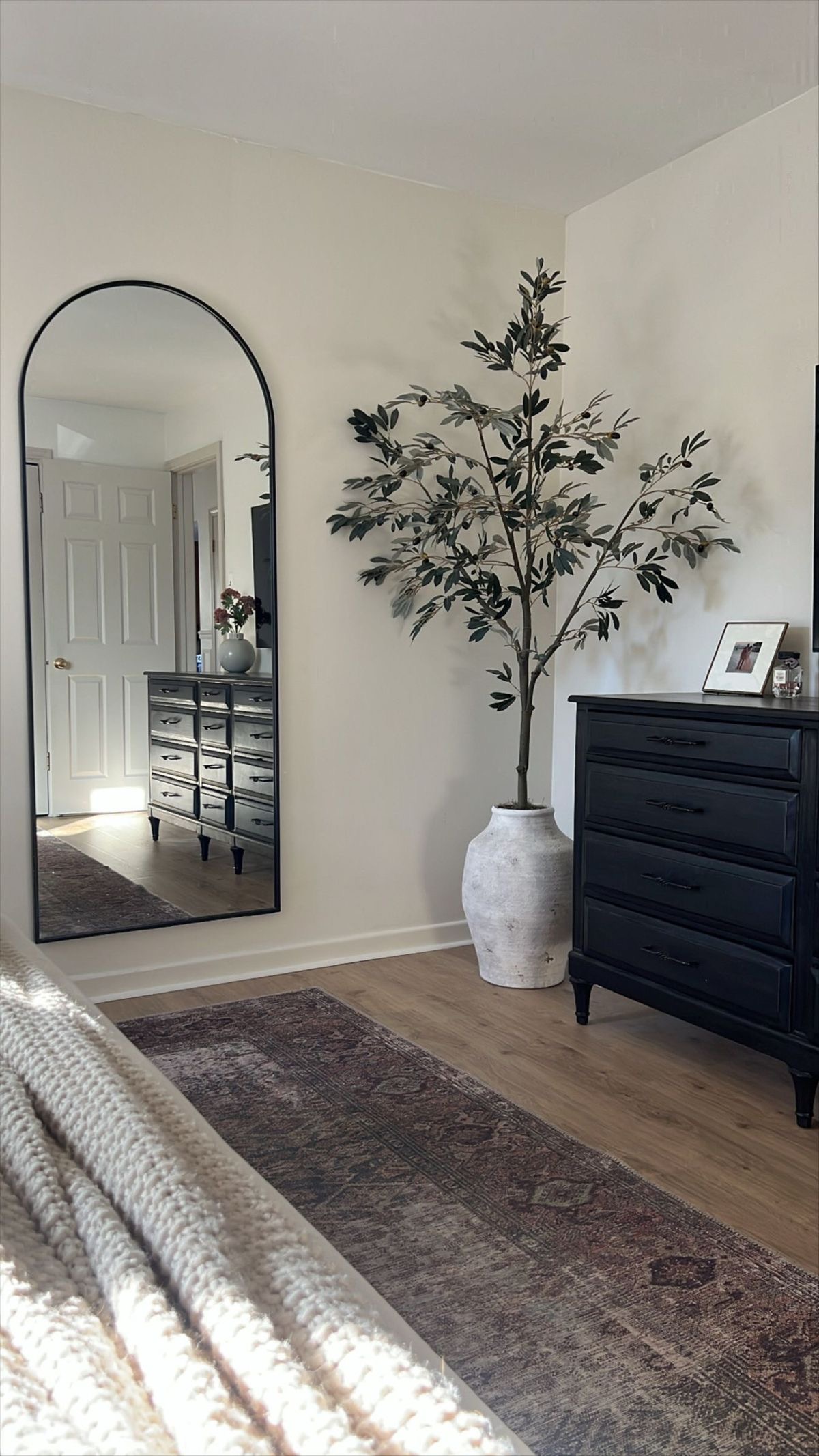 Oversized Arch Mirror Reflects Light and Adds Depth