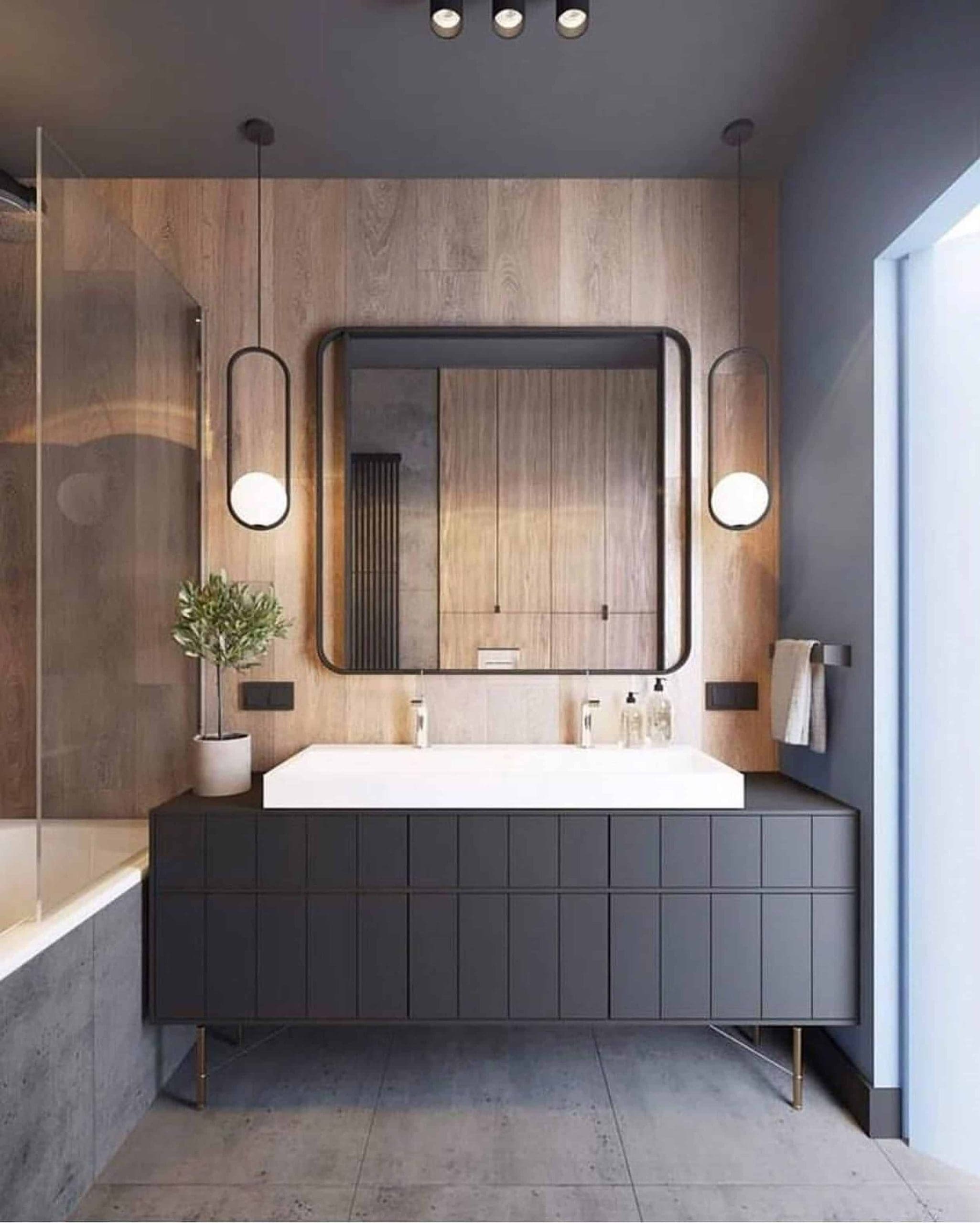 Vertical Wood Paneling Adds Natural Warmth Behind Vanity