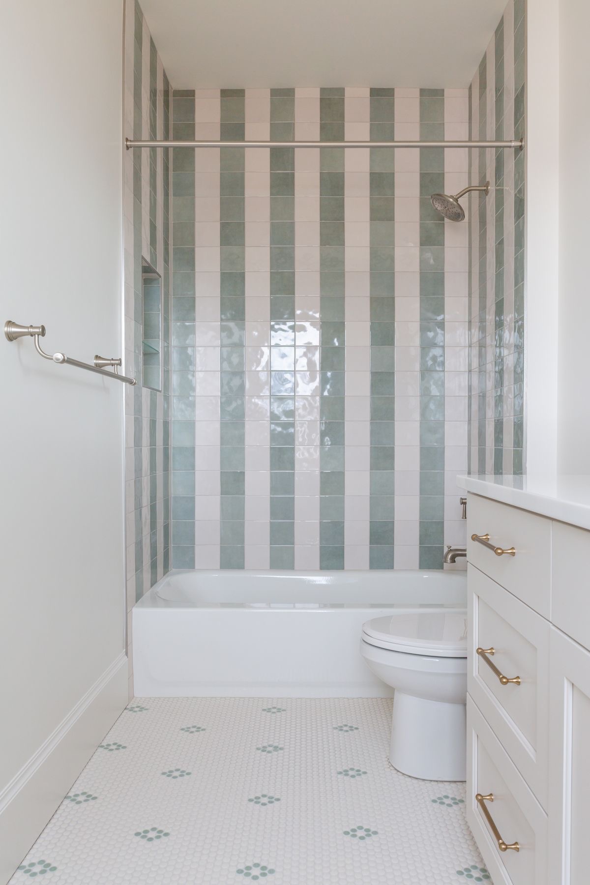 Vertical Stripe Tile Creates a Playful Shower Backdrop