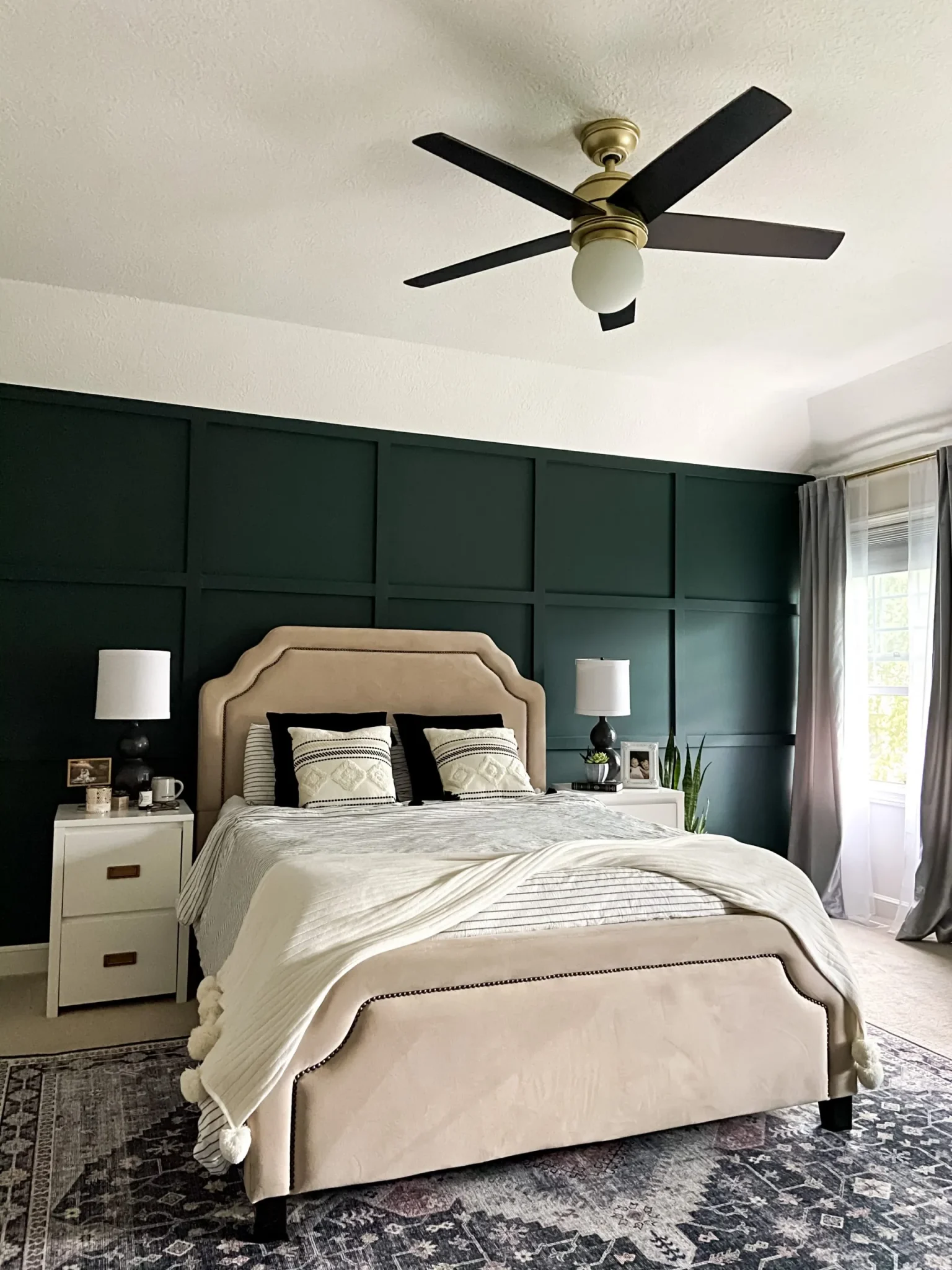 Deep Emerald Grid Panel Walls Create a Dramatic Bedroom Backdrop