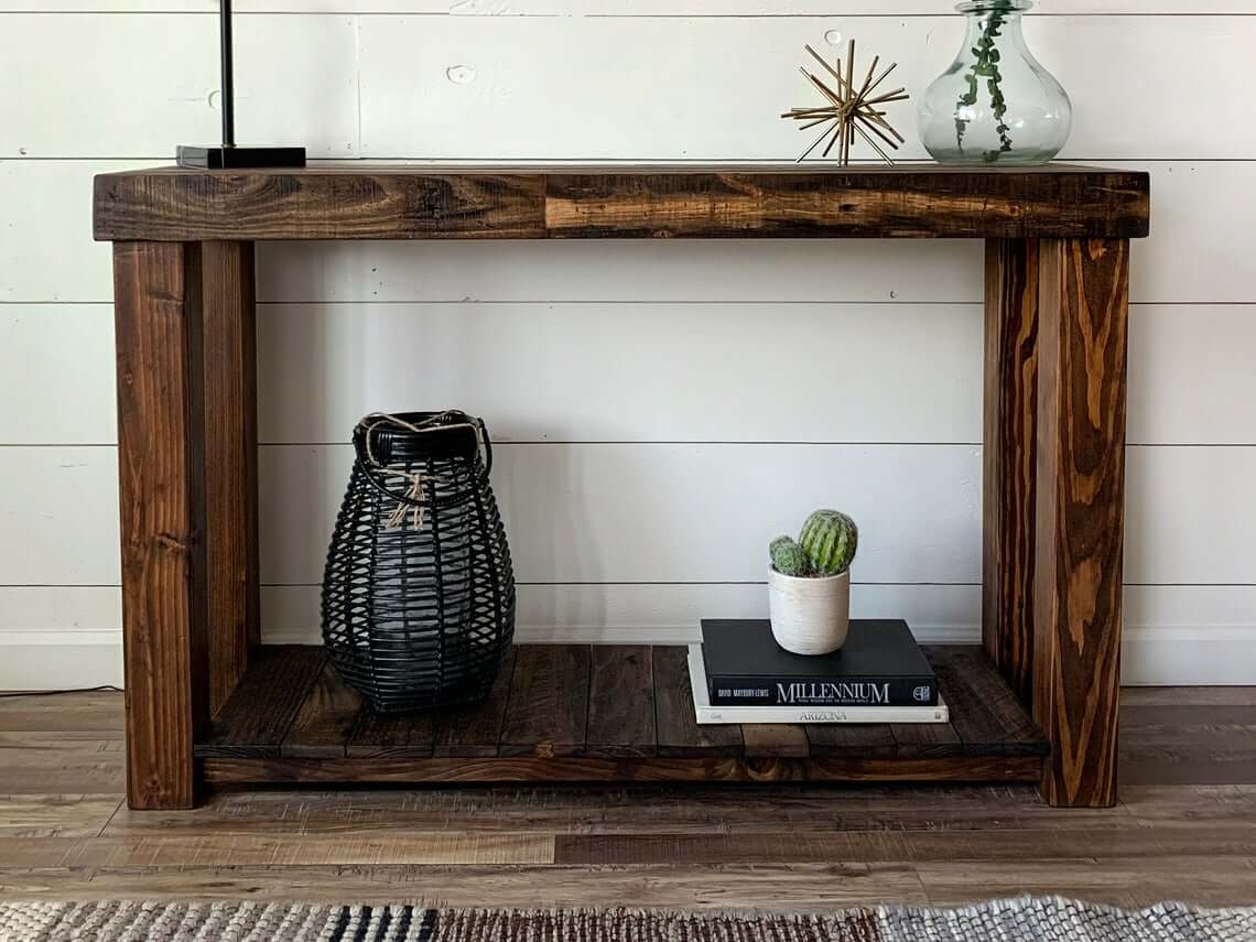 Dark Wood Console With Rustic Lantern and Potted Cactus