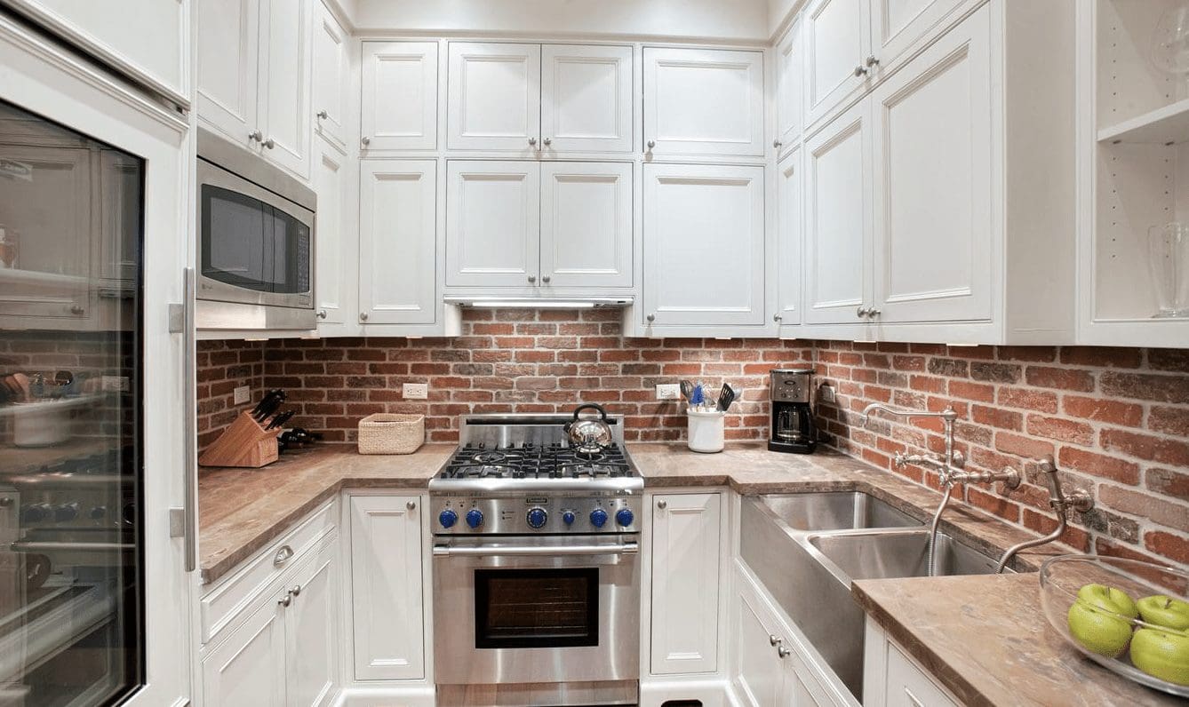 Distressed Red Brick Backsplash Adds Industrial Charm