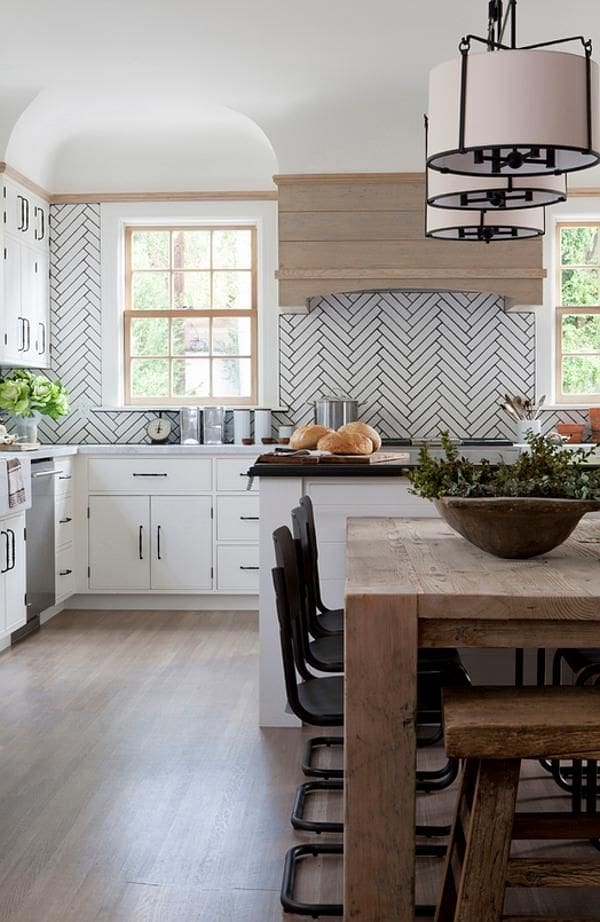 White Herringbone Tile Backsplash with Black Hardware
