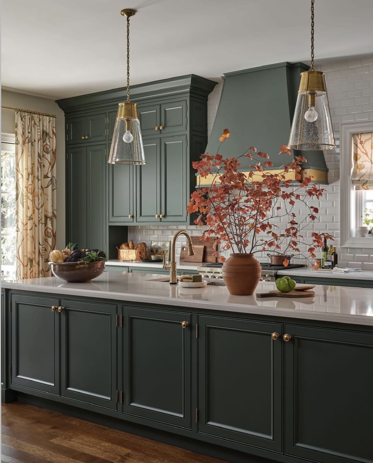 Concentric Hood Vent With Brass Accents Creates a Dramatic Focal Point