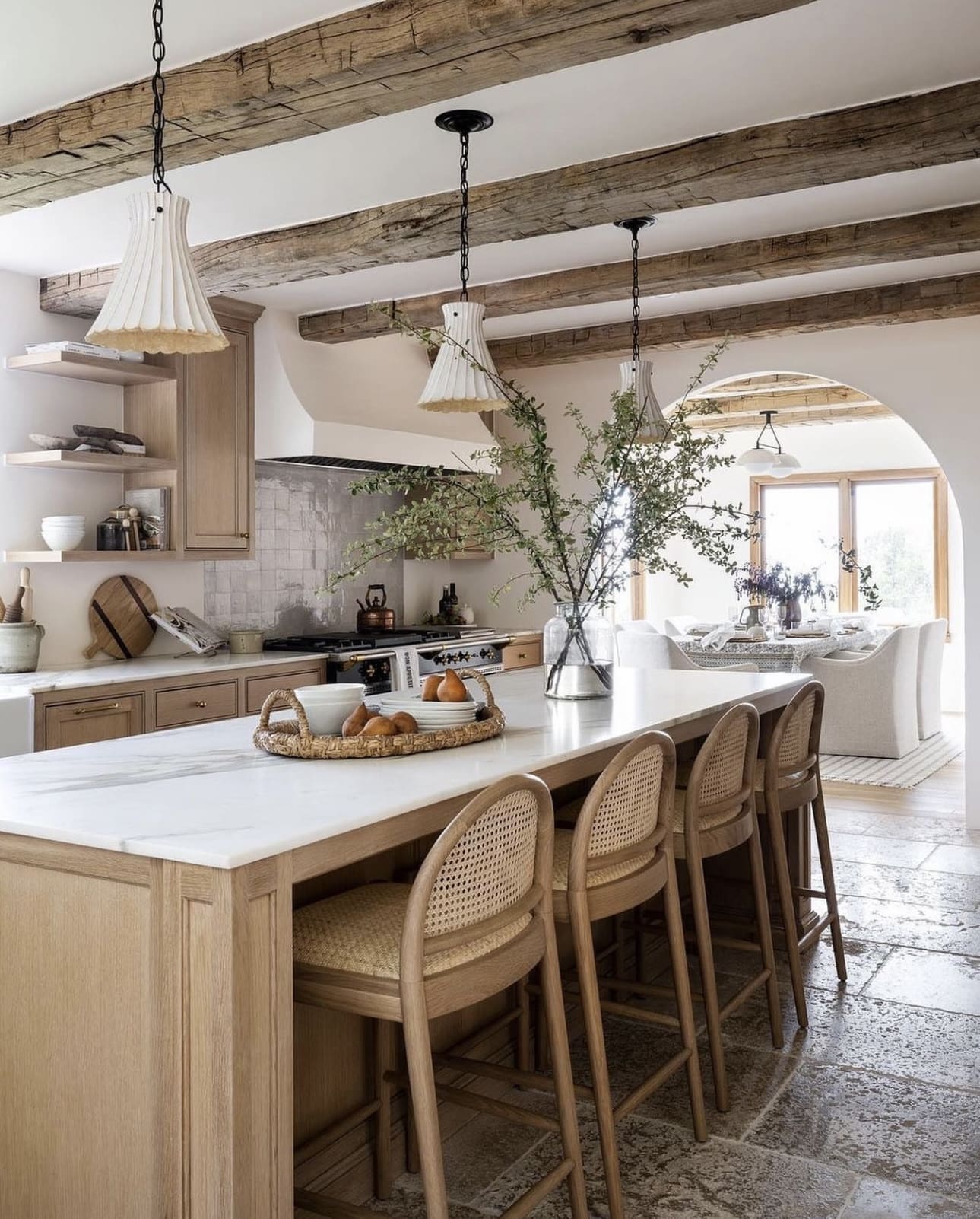 Rattan-Back Bar Stools Add Natural Texture to Kitchen Island