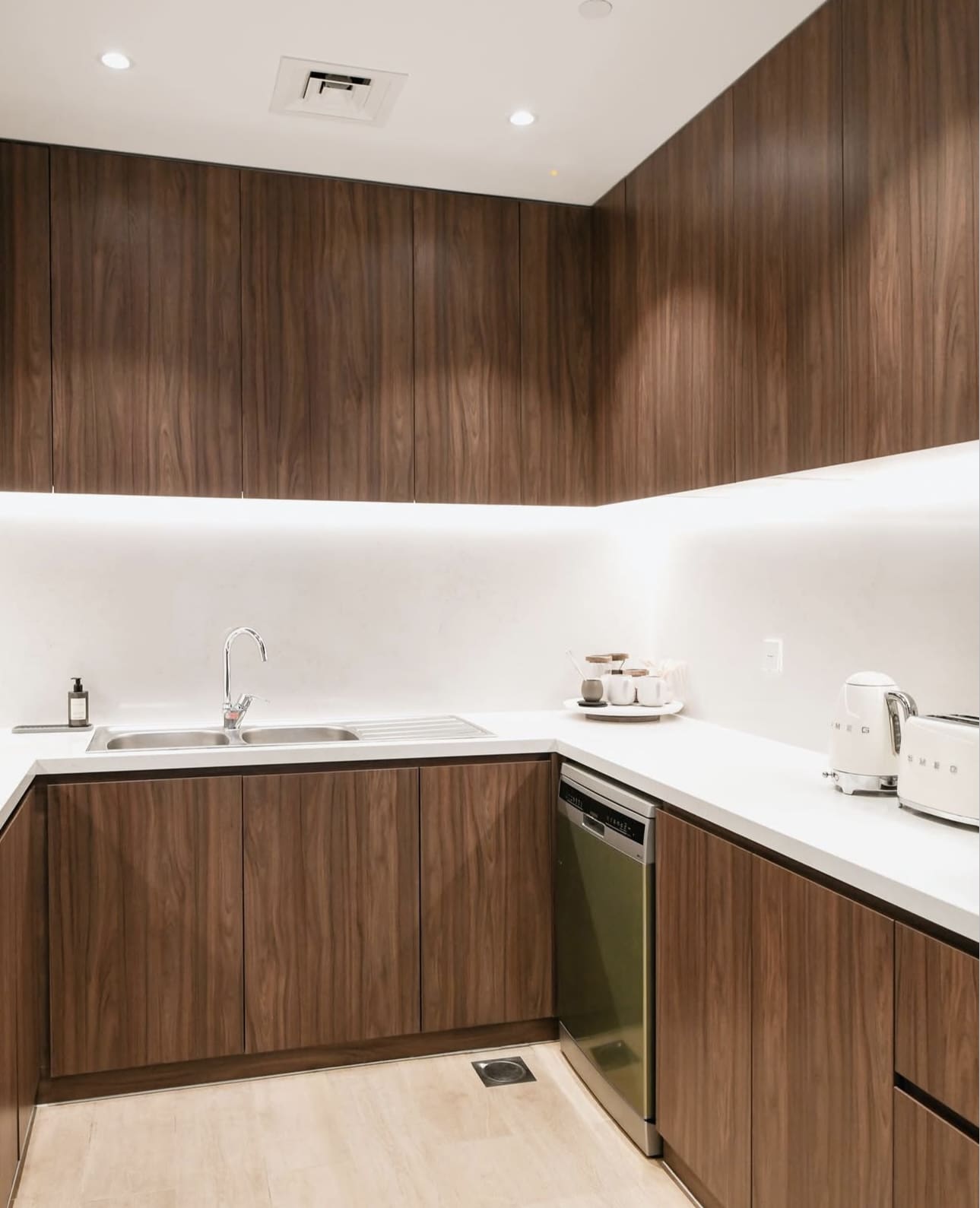 Modern Walnut Cabinetry with Integrated Under-Cabinet Lighting