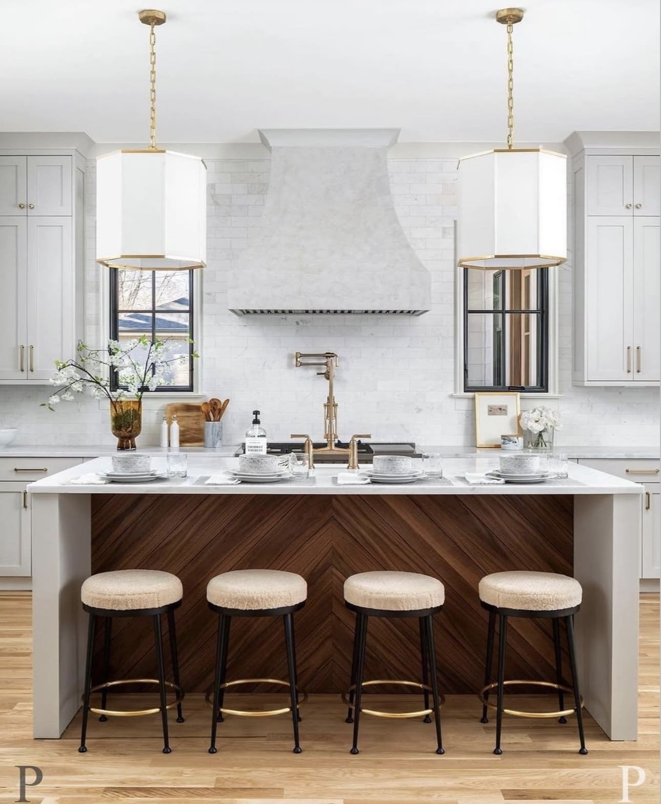 Chevron-Patterned Walnut Island Adds Warmth to a Modern Kitchen