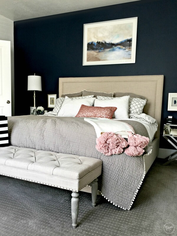 Textured Navy Walls Anchor a Serene Bedroom