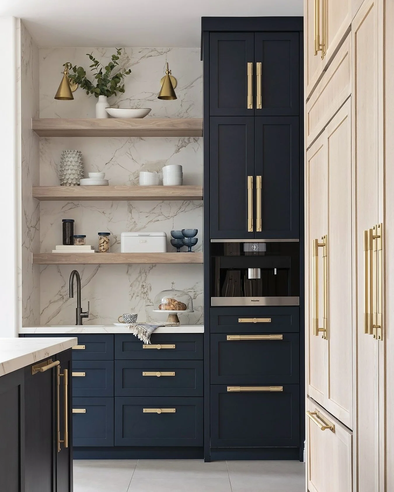 Brass Cone Sconces Add Warm Task Lighting to Open Shelving