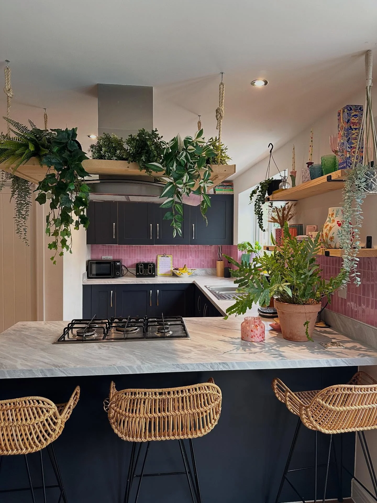 Hanging Plant Shelves Create a Lush, Layered Look
