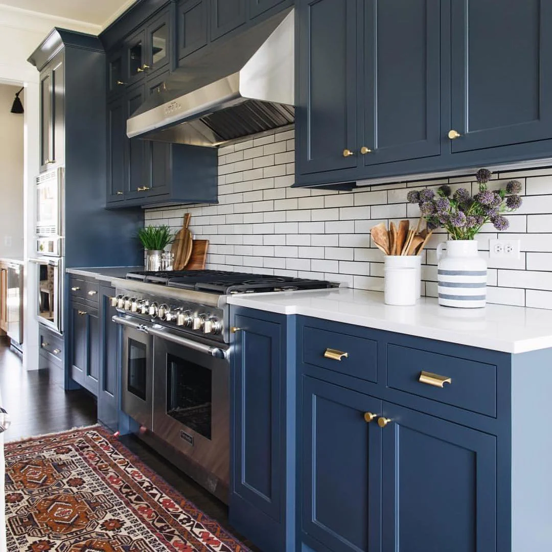 Navy Shaker Cabinets With Brass Drawer Pulls