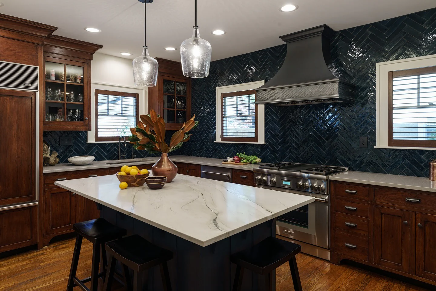Dark Herringbone Tile Backsplash Creates a Dramatic Kitchen Feature