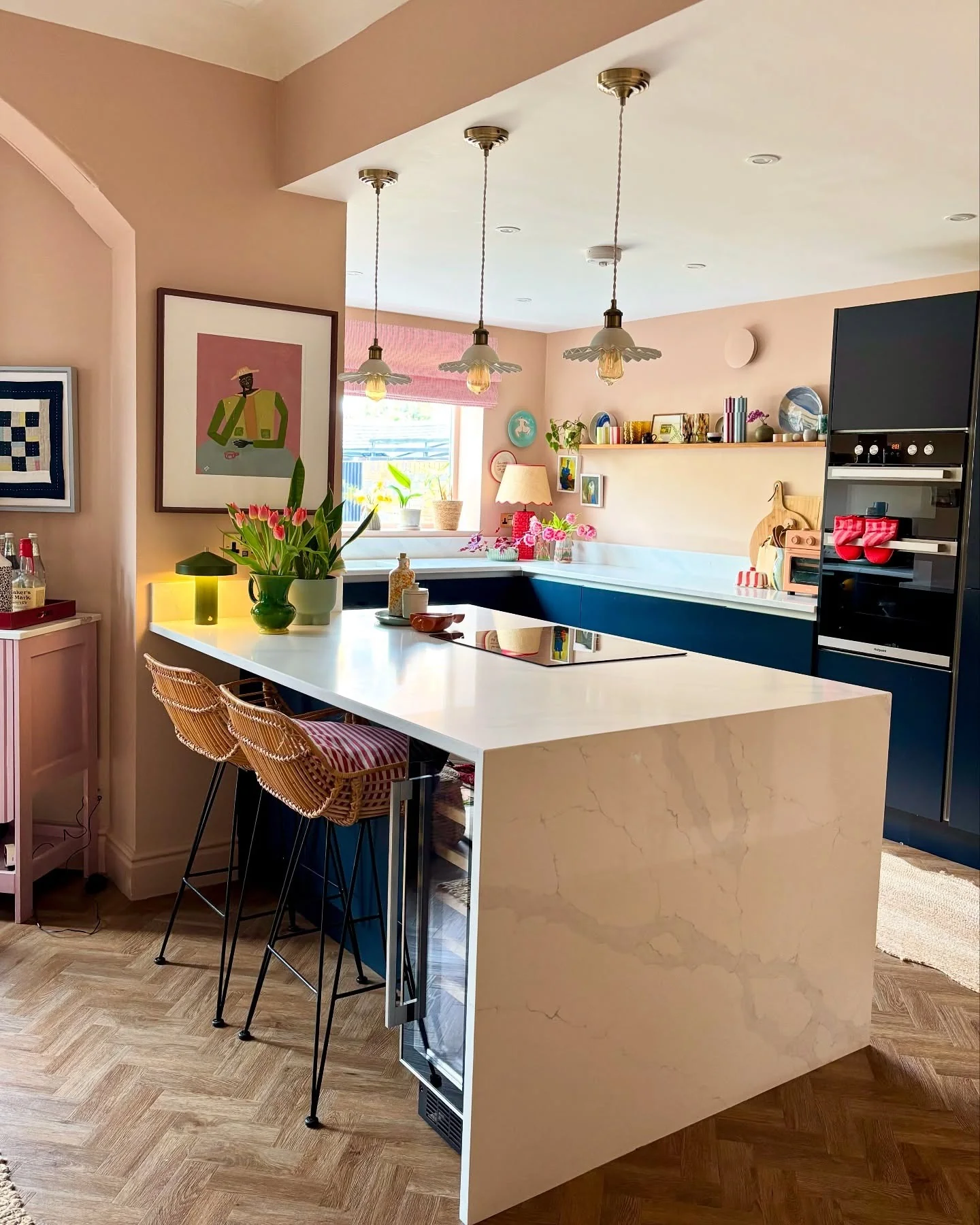 Pair Pink Walls with Navy Cabinets for a Bold Palette