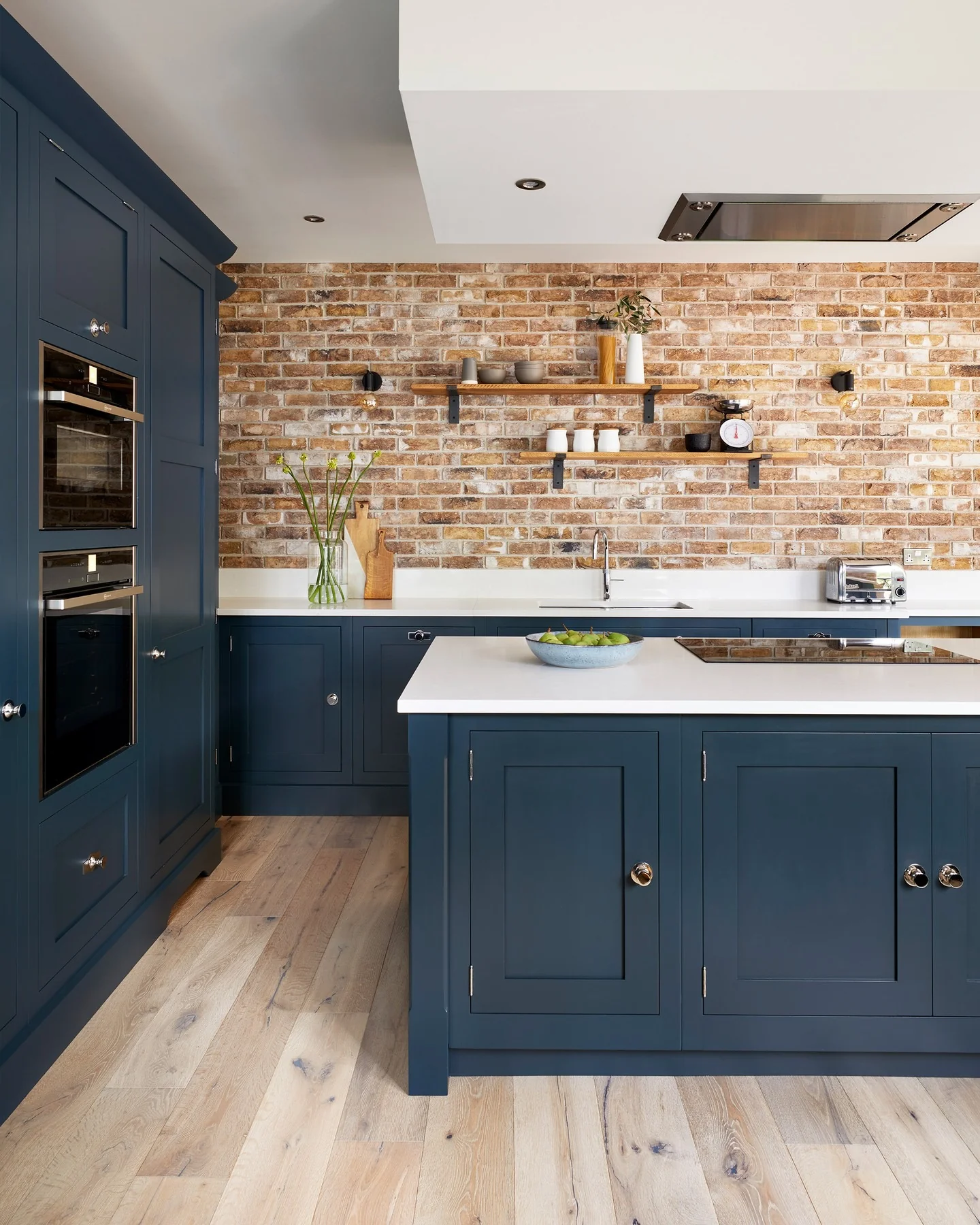 Incorporate Rustic Charm with an Exposed Brick Backsplash