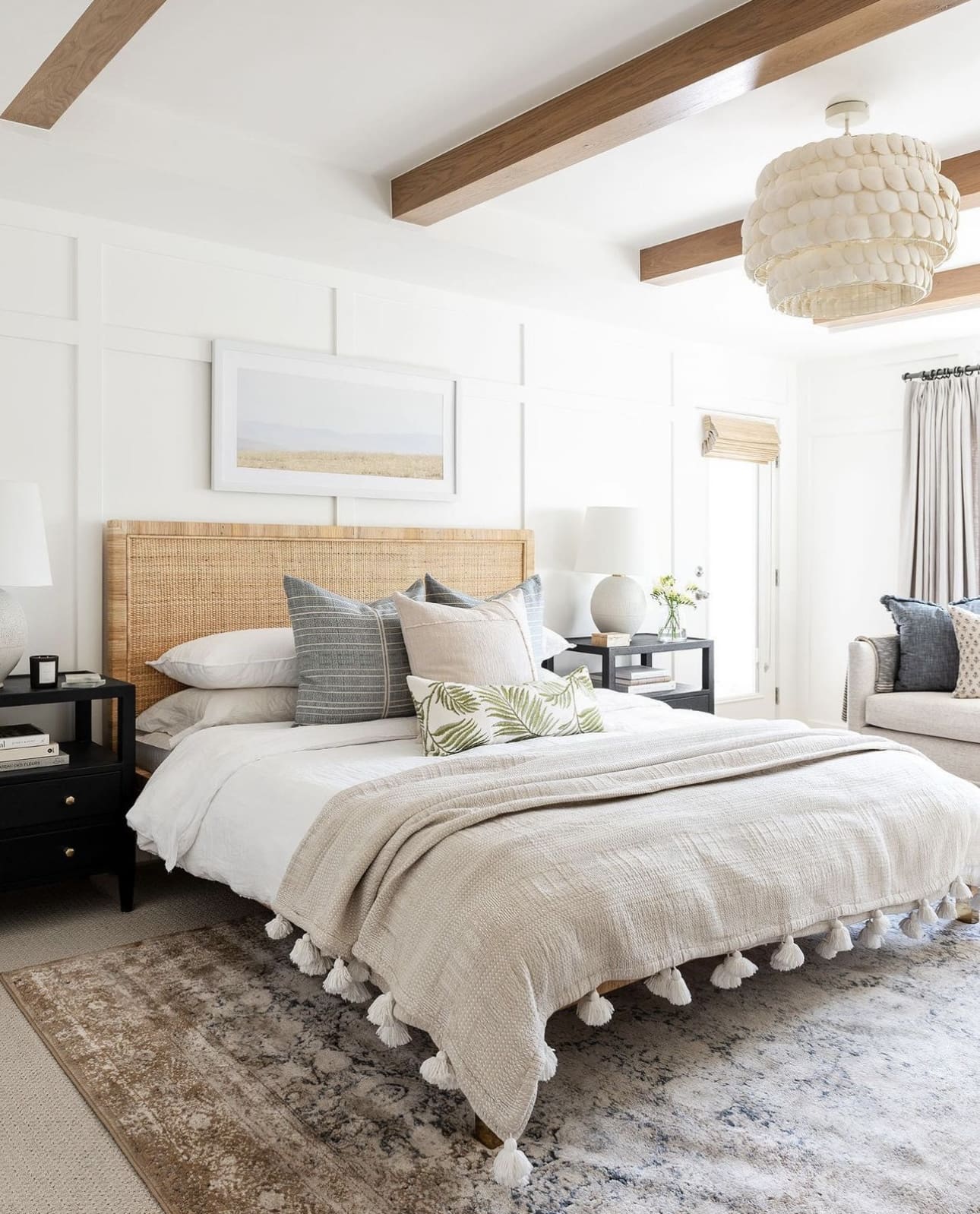 Woven Rattan Headboard Adds Natural Texture to White Walls