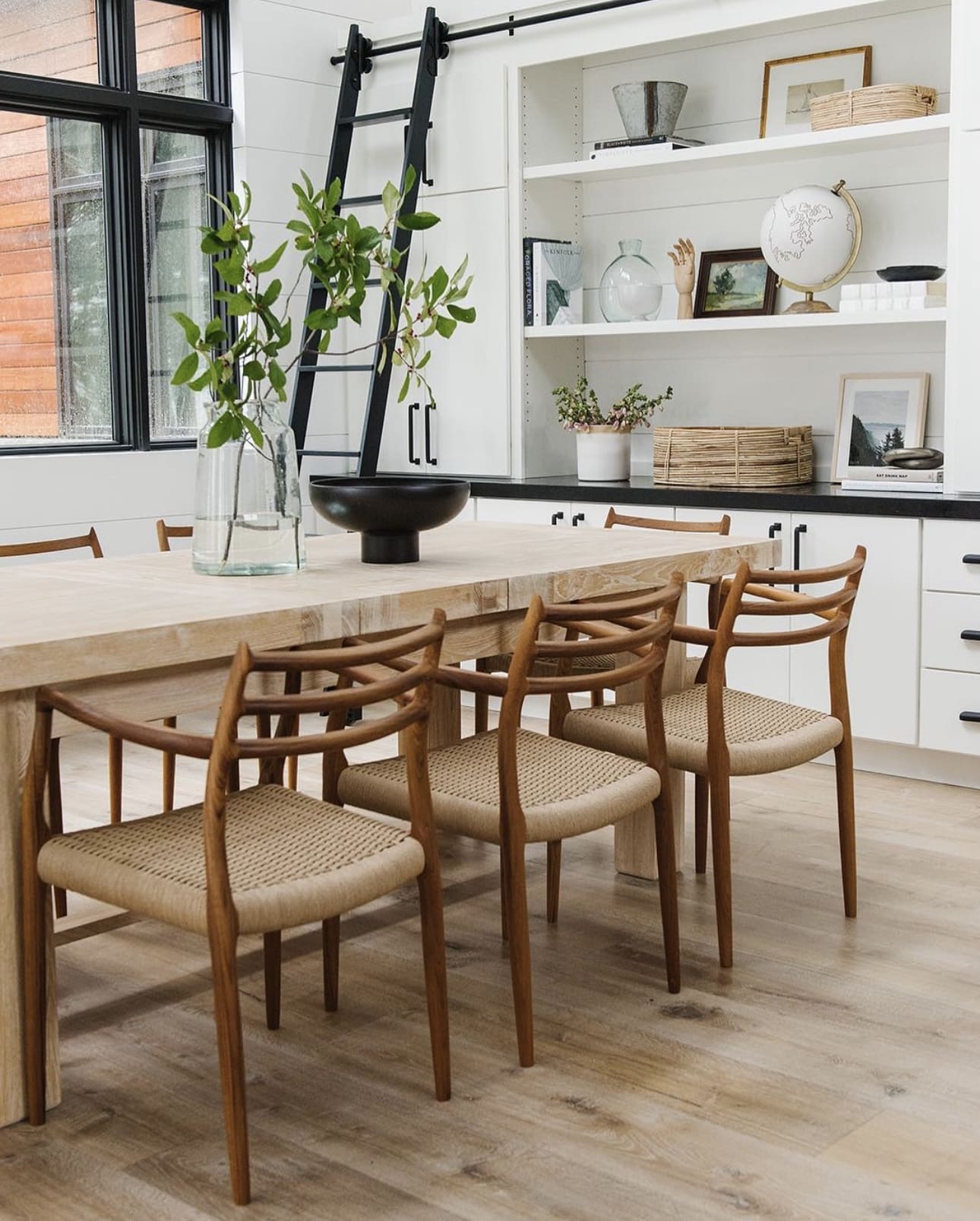 Curved Wood Chairs with Woven Seats Offer Natural Texture