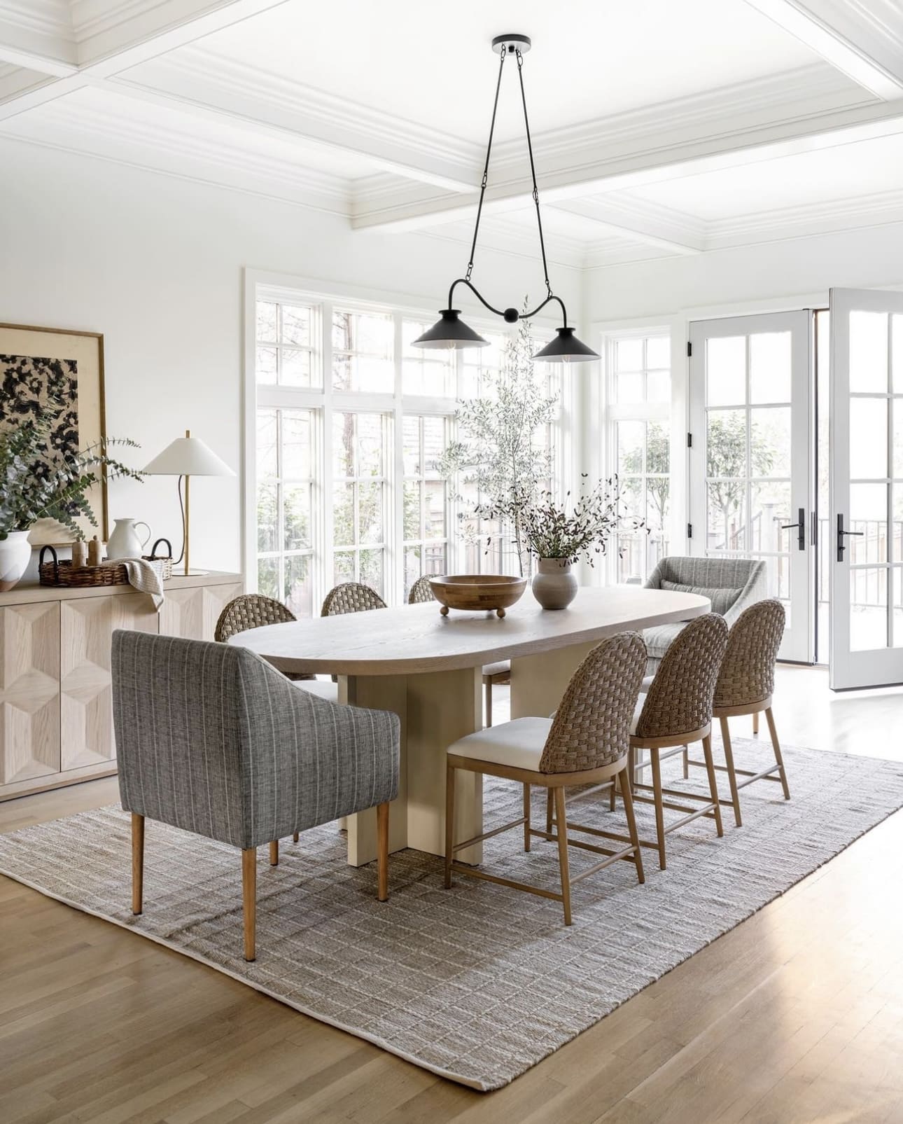 Woven-Back Dining Chairs Add Natural Warmth to the Space