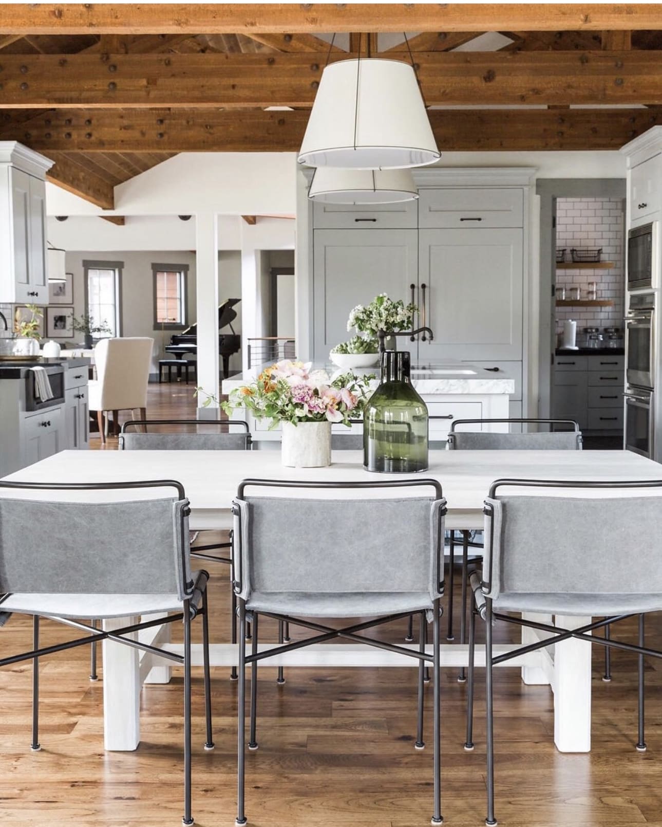 Textured Grey Canvas Chairs Frame a Crisp White Table