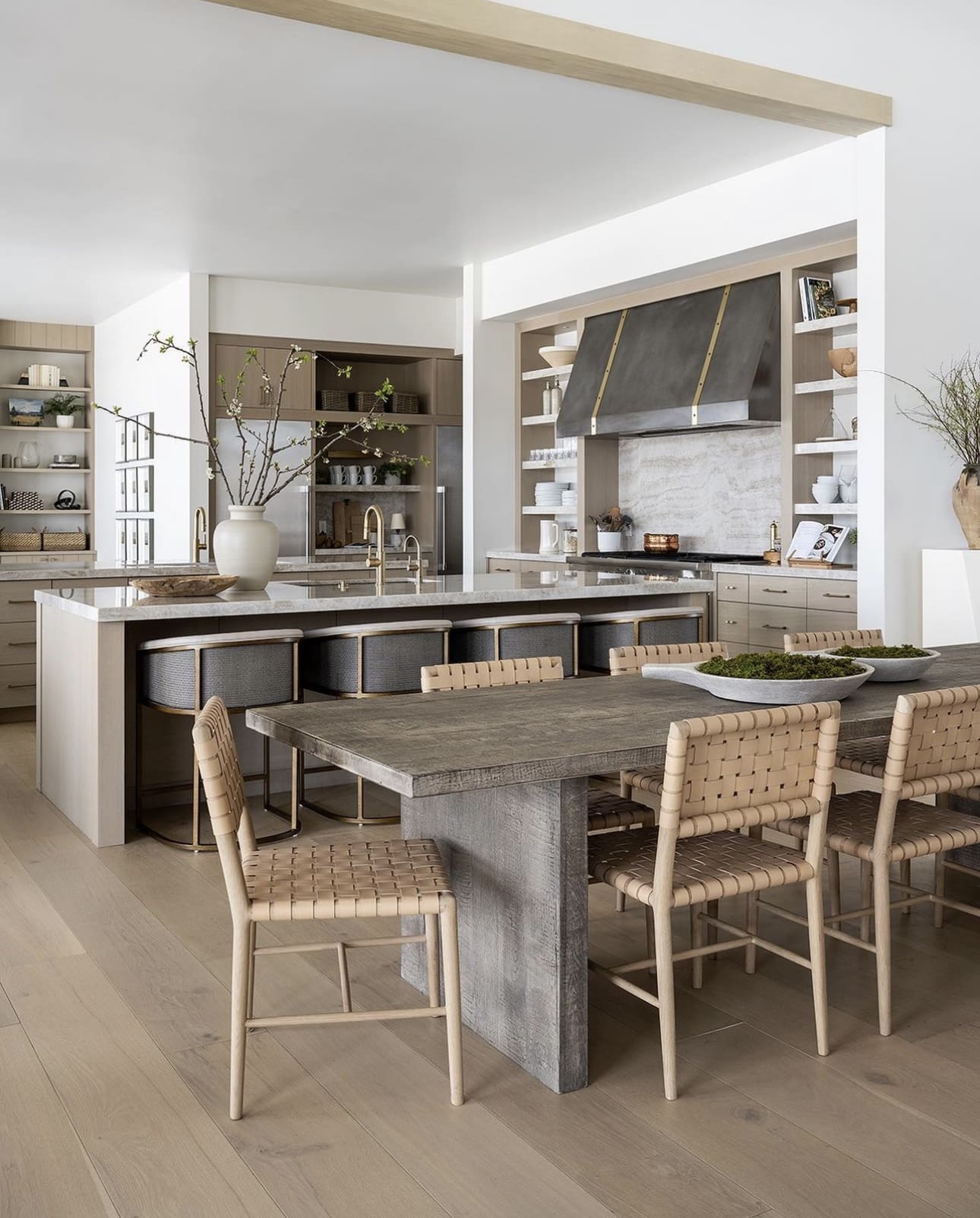 Woven Leather Dining Chairs Add Organic Texture to Large Table