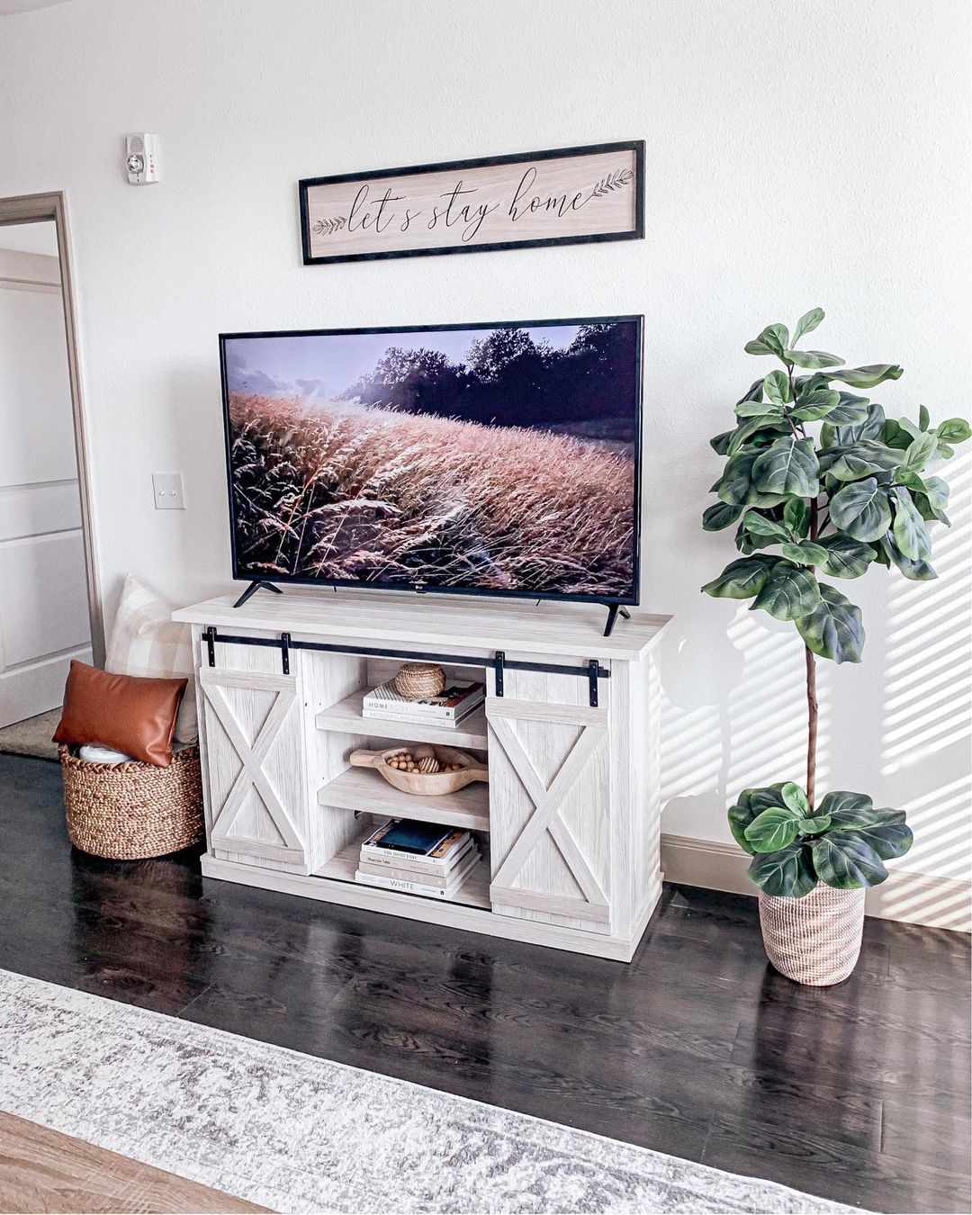 White Barn Door TV Stand Hides Clutter With Sliding Doors