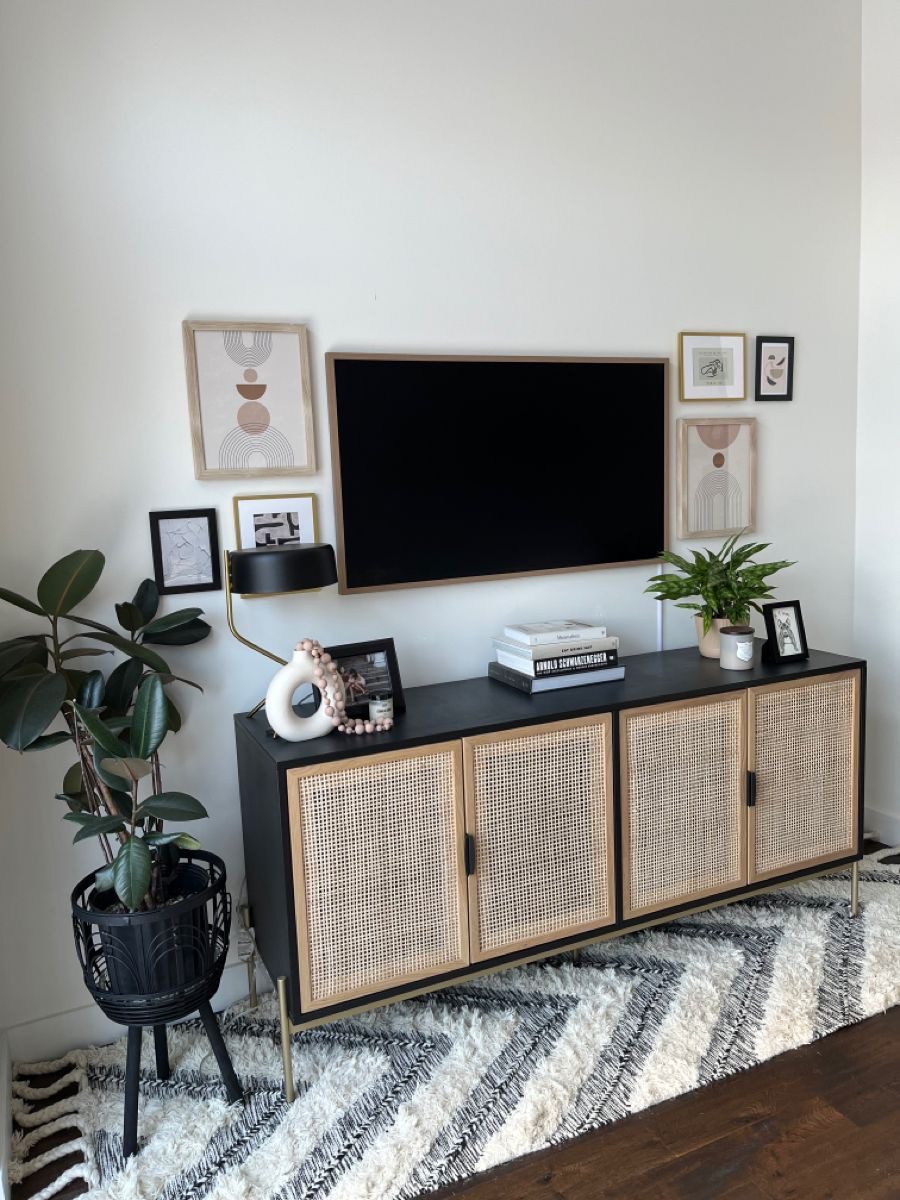 Gallery Wall Art Adds Personality Above Black Media Console