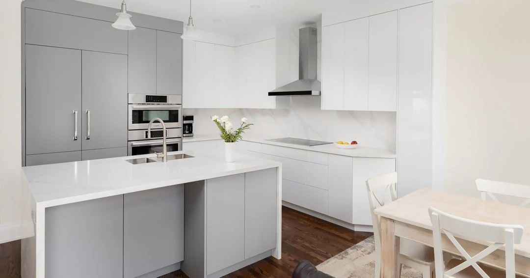Embrace Minimalism with Matte Gray Cabinets and Integrated Hardware