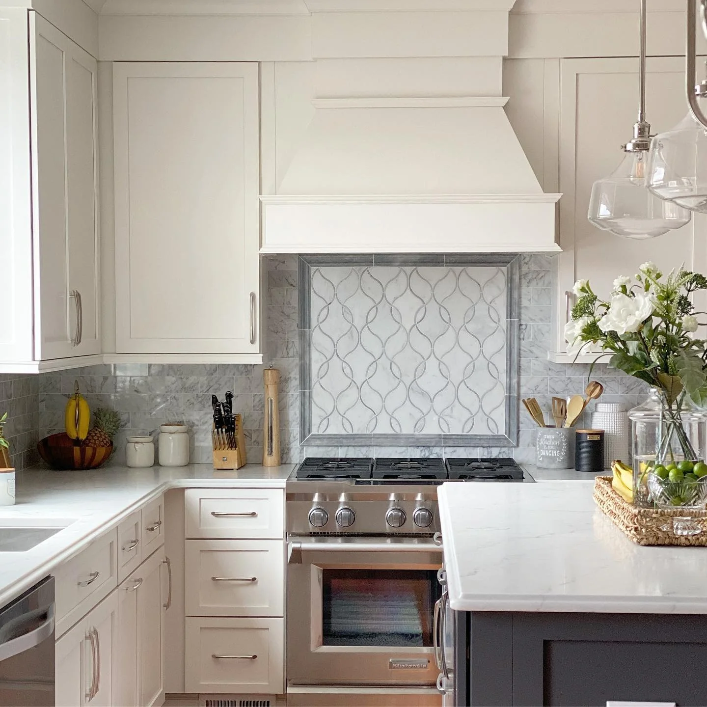 Mosaic Tile Backsplash Adds Pattern Above Stove