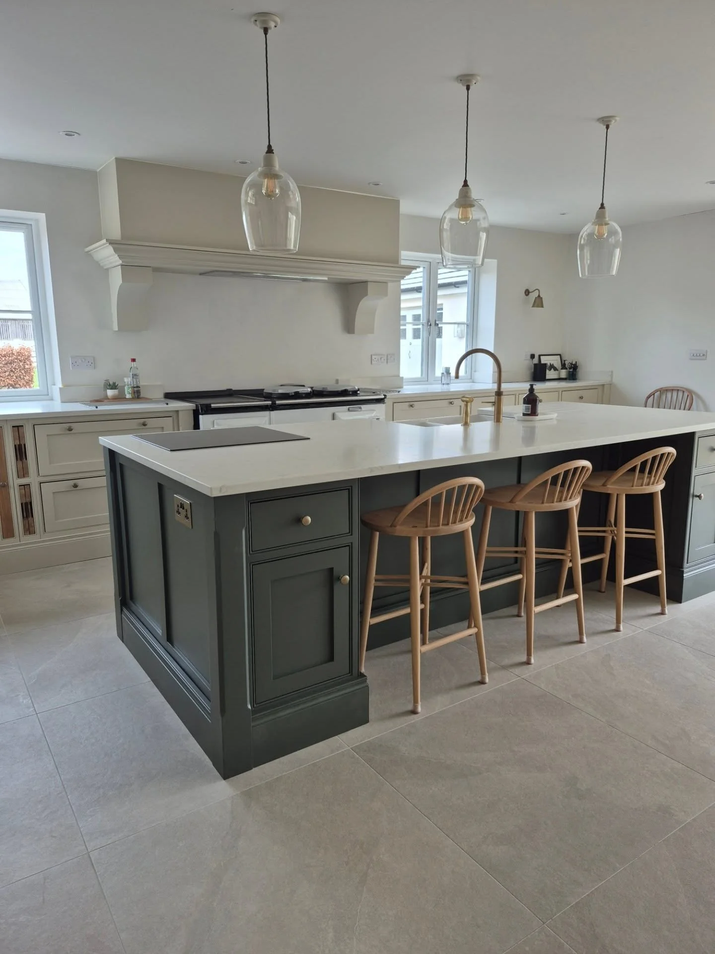 Enhance Your Island with Paneled Gray Cabinetry