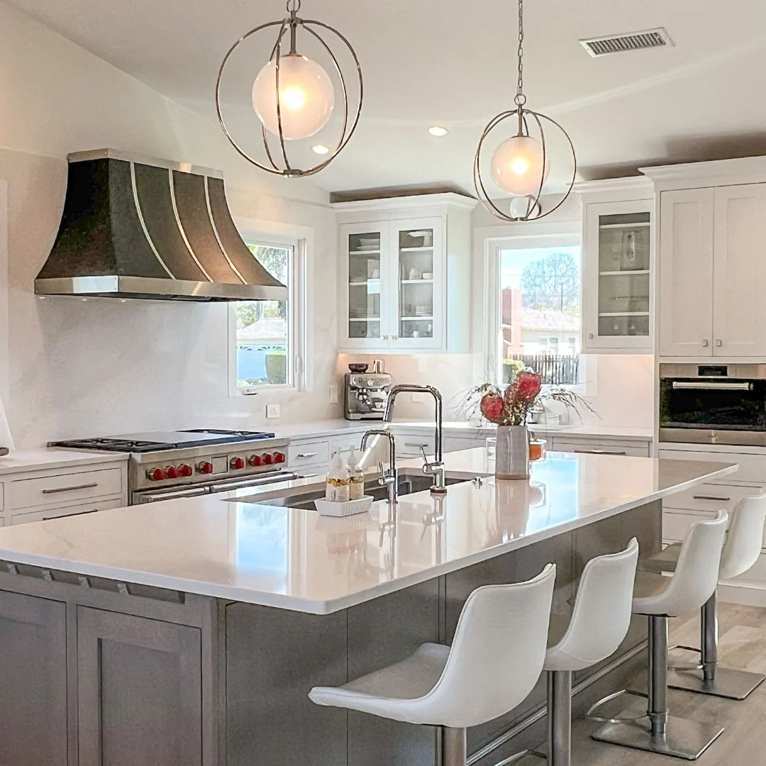 Anchor White Countertops with Muted Gray Island Cabinets