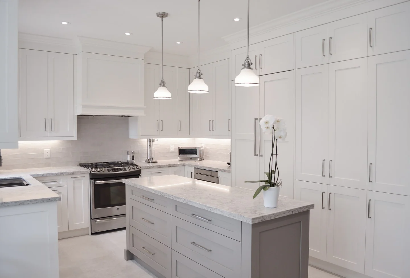 Anchor White Cabinets with a Gray Island