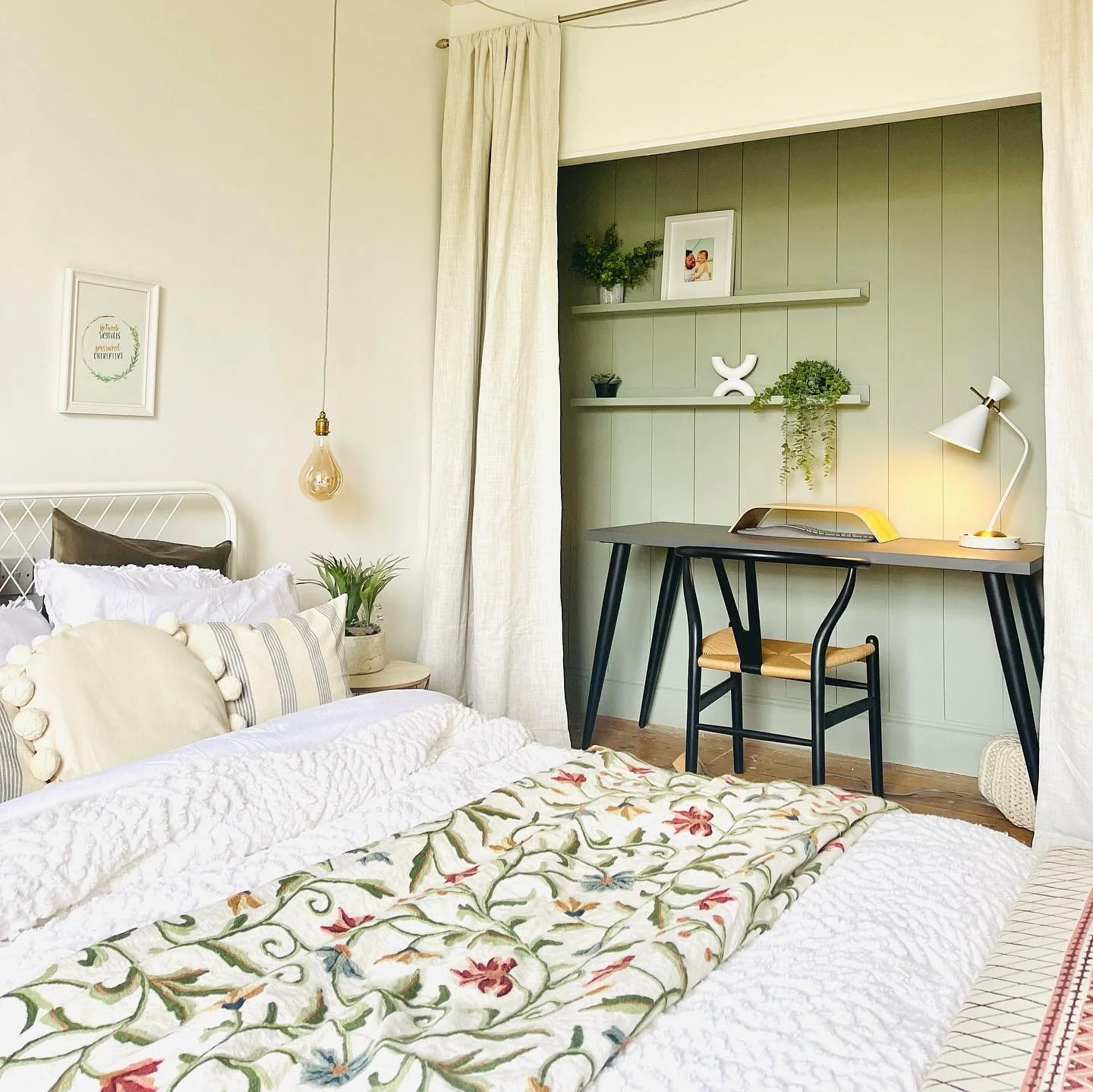 Green Paneled Wall Creates a Cozy Home Office Nook