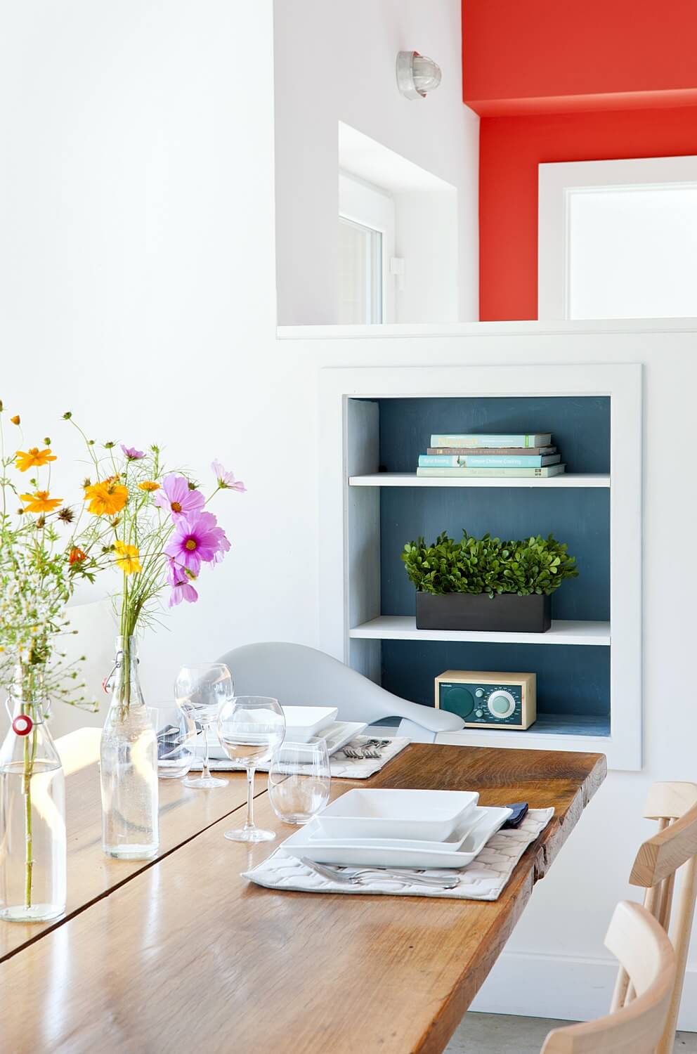 Built-in Shelving Unit With Deep Blue Backing