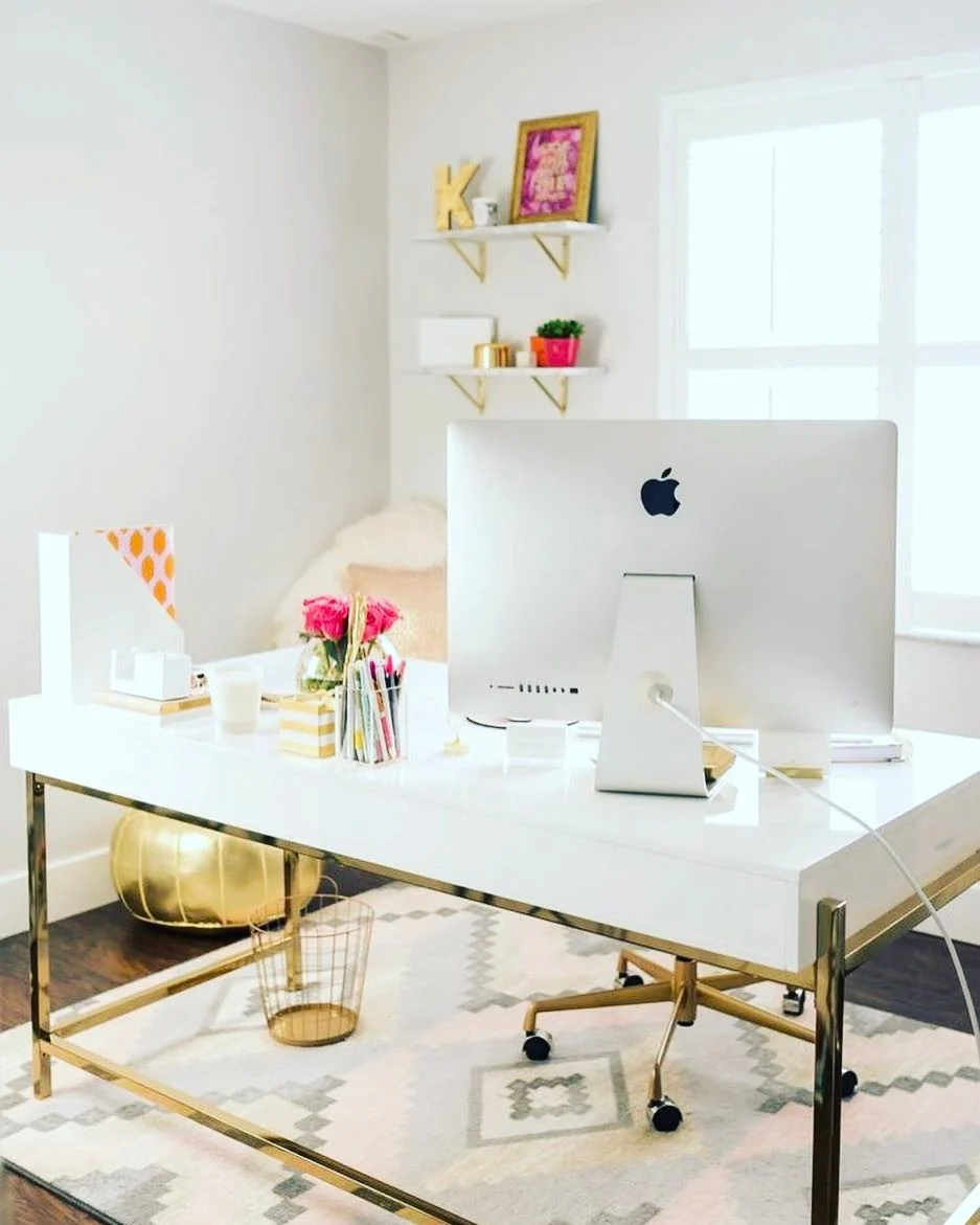 Glamorous Gold Legs Elevate a White Lacquer Desk