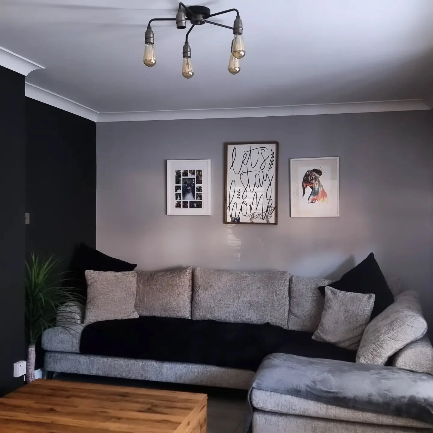 Gallery Wall Arrangement Adds Personal Style Above Sofa