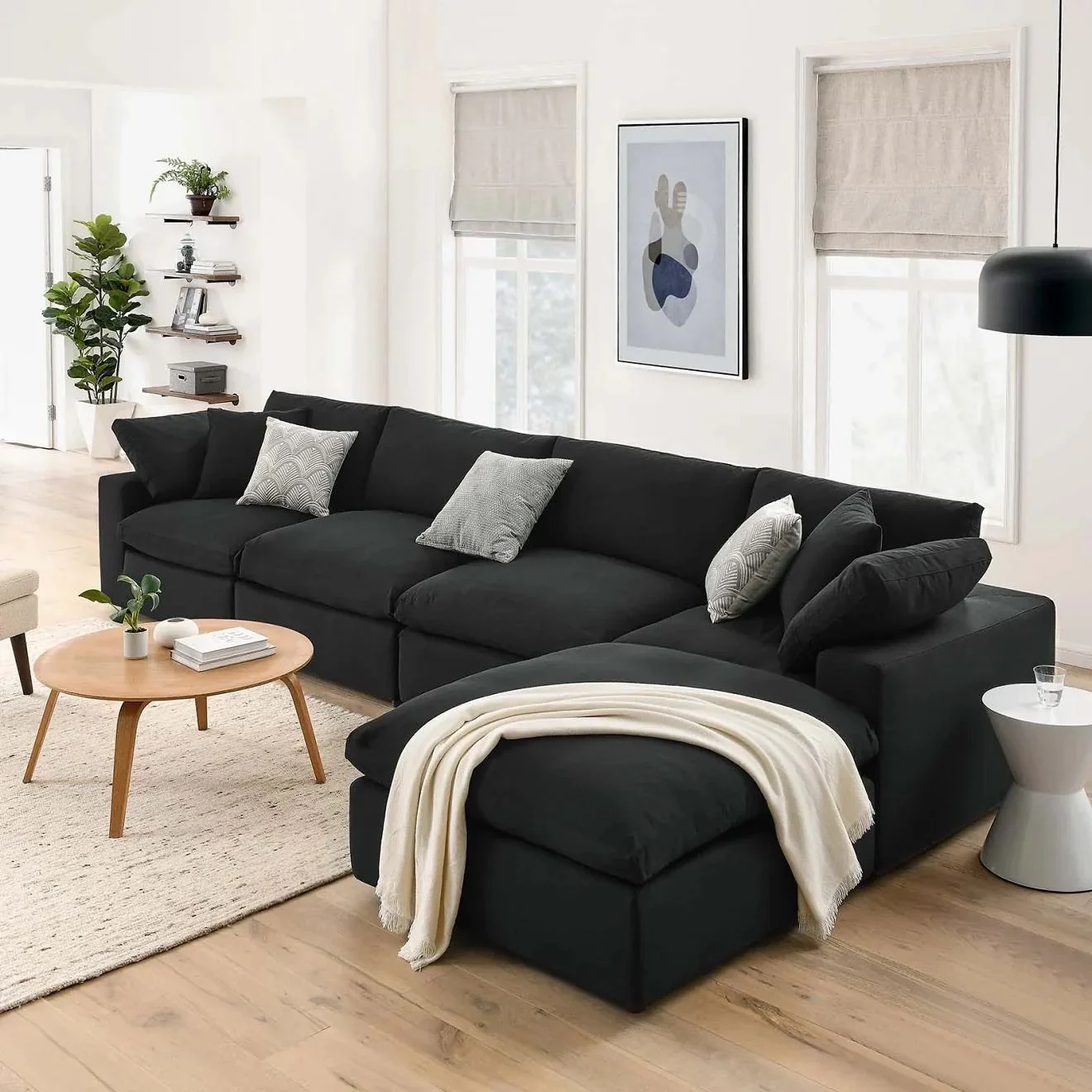 Deep Black Sectional Sofa Invites Relaxation