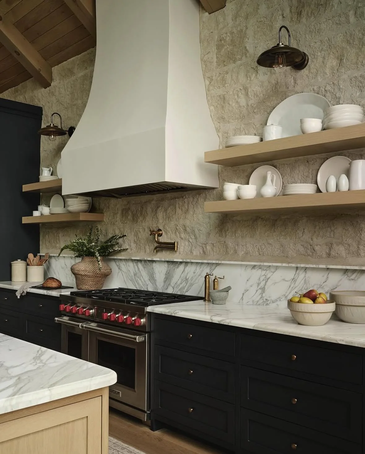 Open Wood Shelves Against Stone Walls