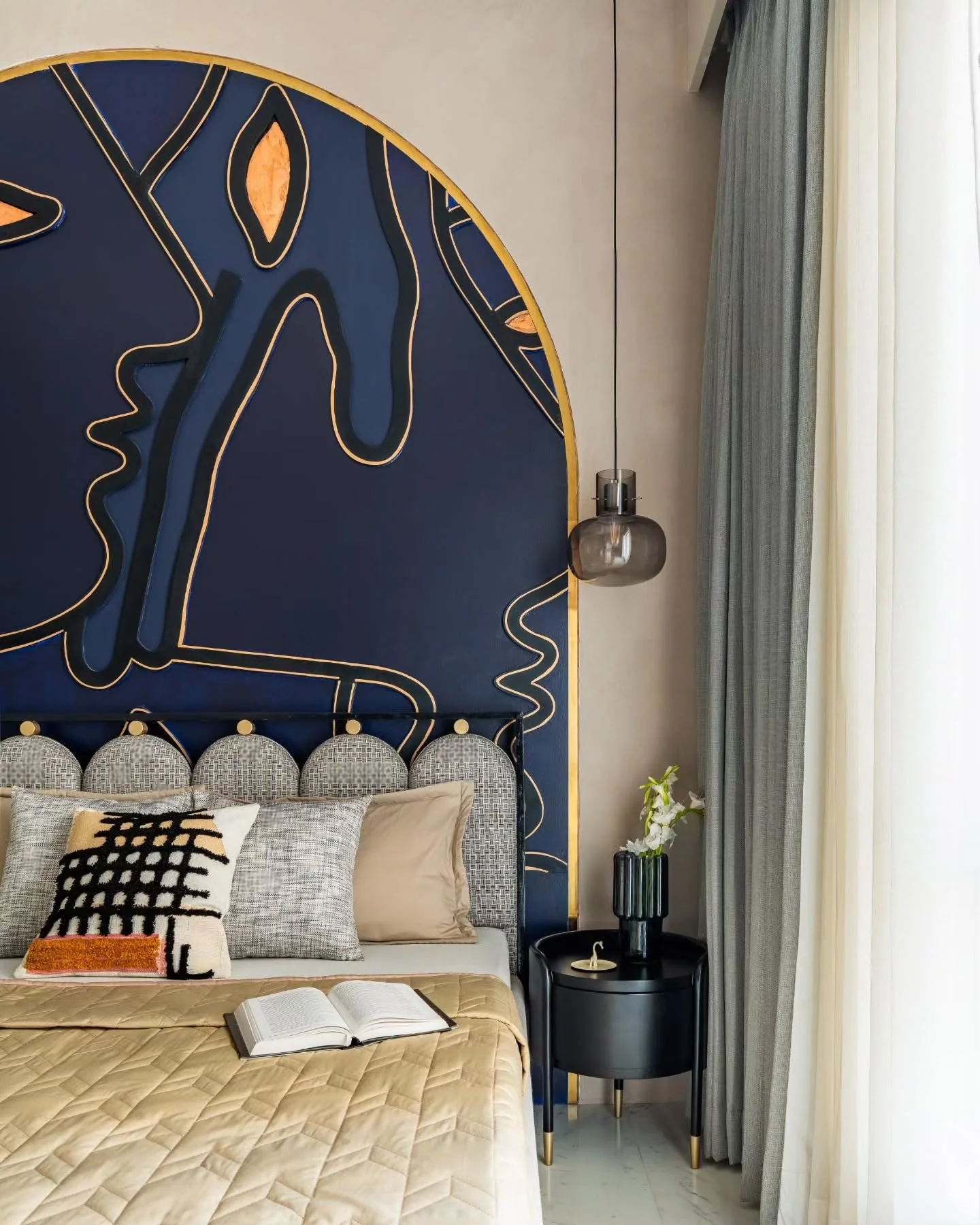 Arched Headboard Mural with Gold Trim Adds Bold Art