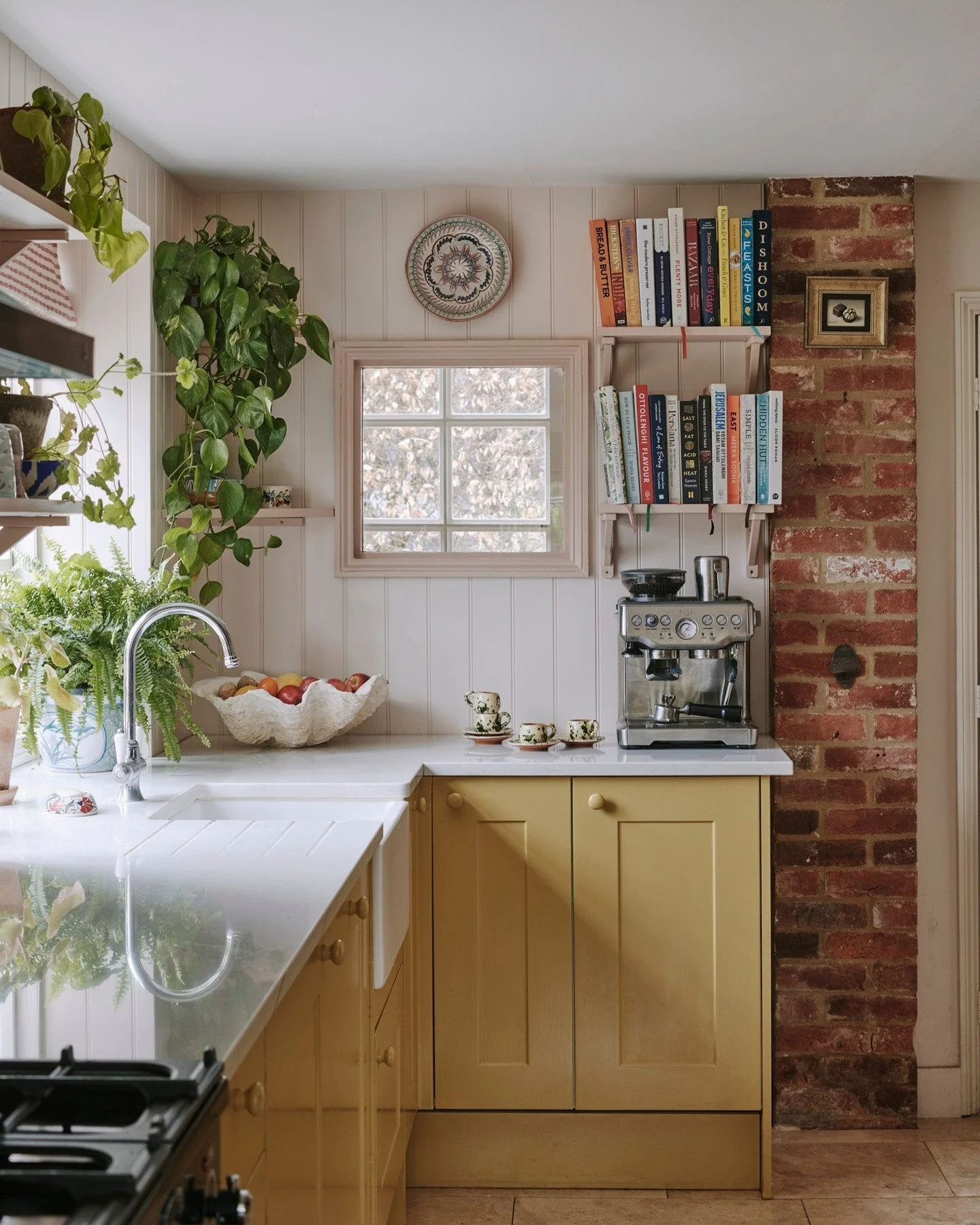 Open Shelving Above Coffee Station Holds Cookbooks