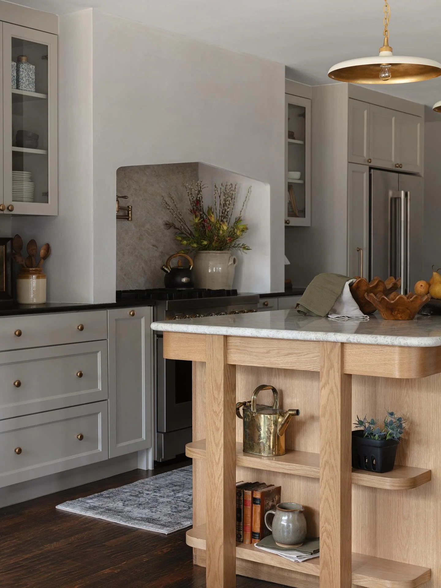 Open Wood Shelving on Island Displays Decorative Accents