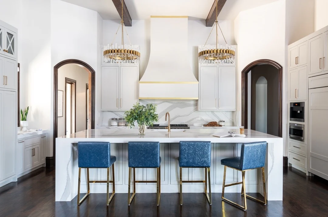 Kitchen Island with Waterfall Countertop and Blue Bar Stools