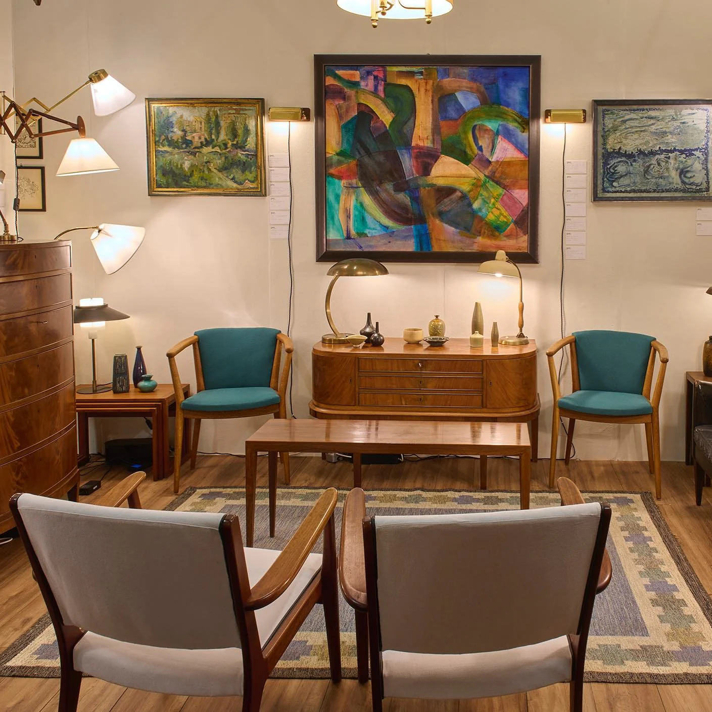 Frame Your Rug with Sculptural Wood Chairs