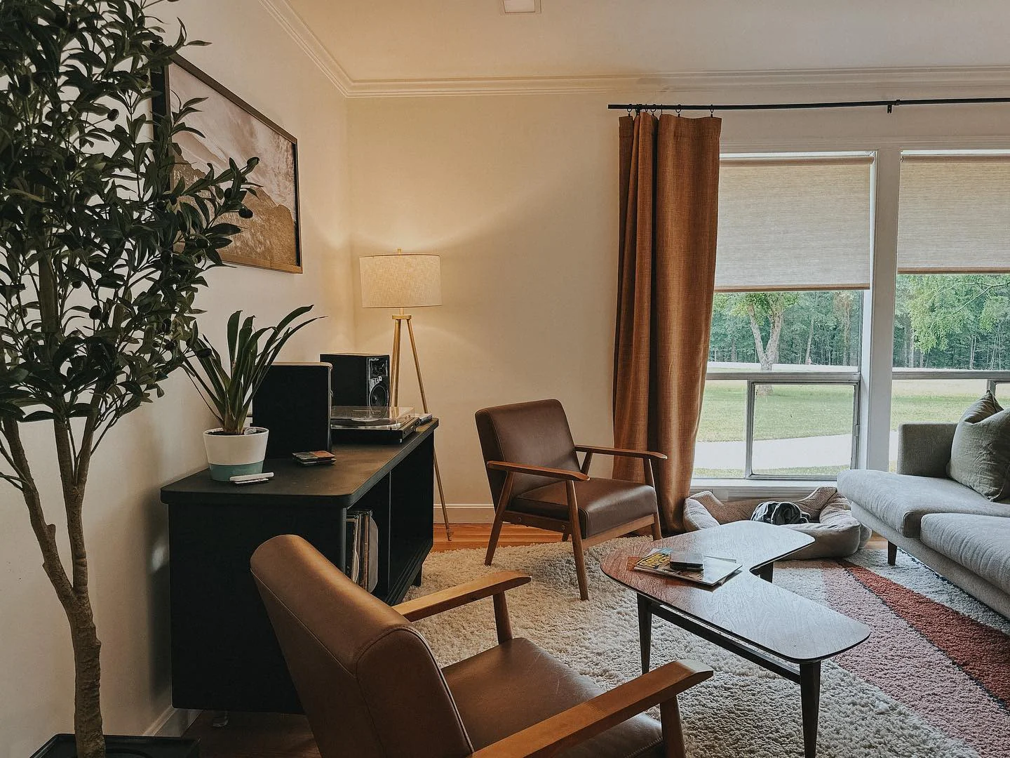 Gather Around an Asymmetrical Coffee Table with Mid-Century Chairs