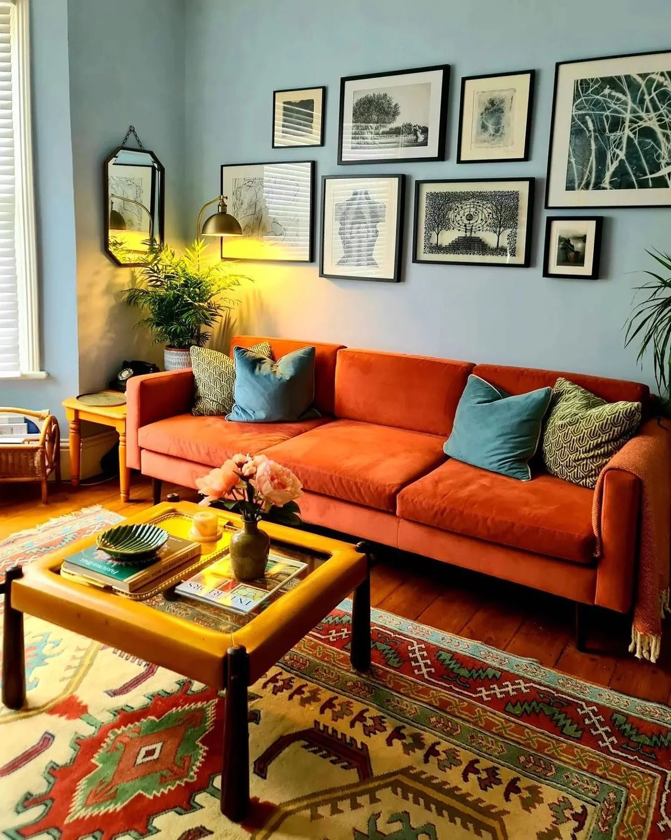 Gallery Wall Anchors Bold Orange Sofa