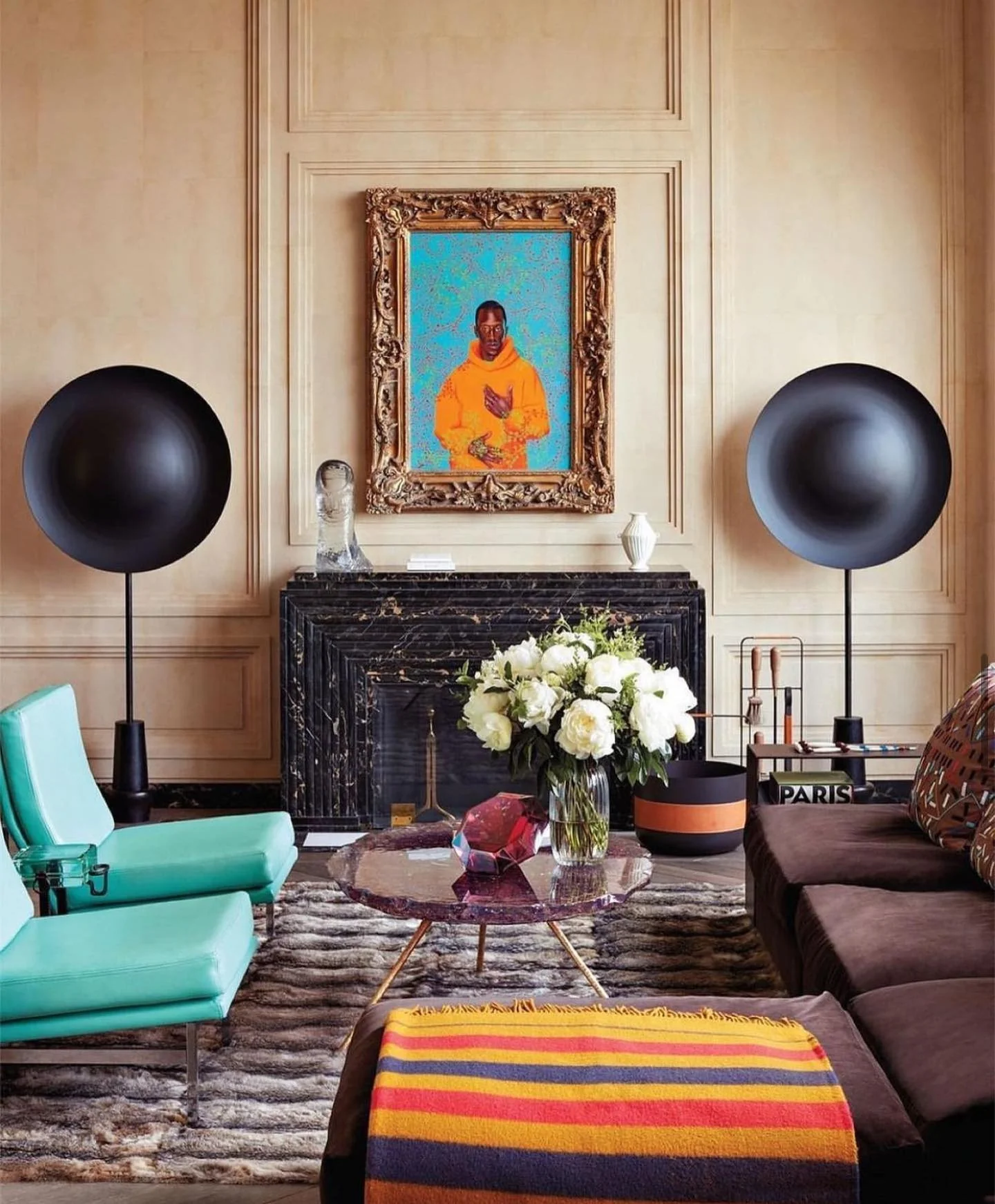 Draw the Eye to Your Fireplace with a Bold Portrait